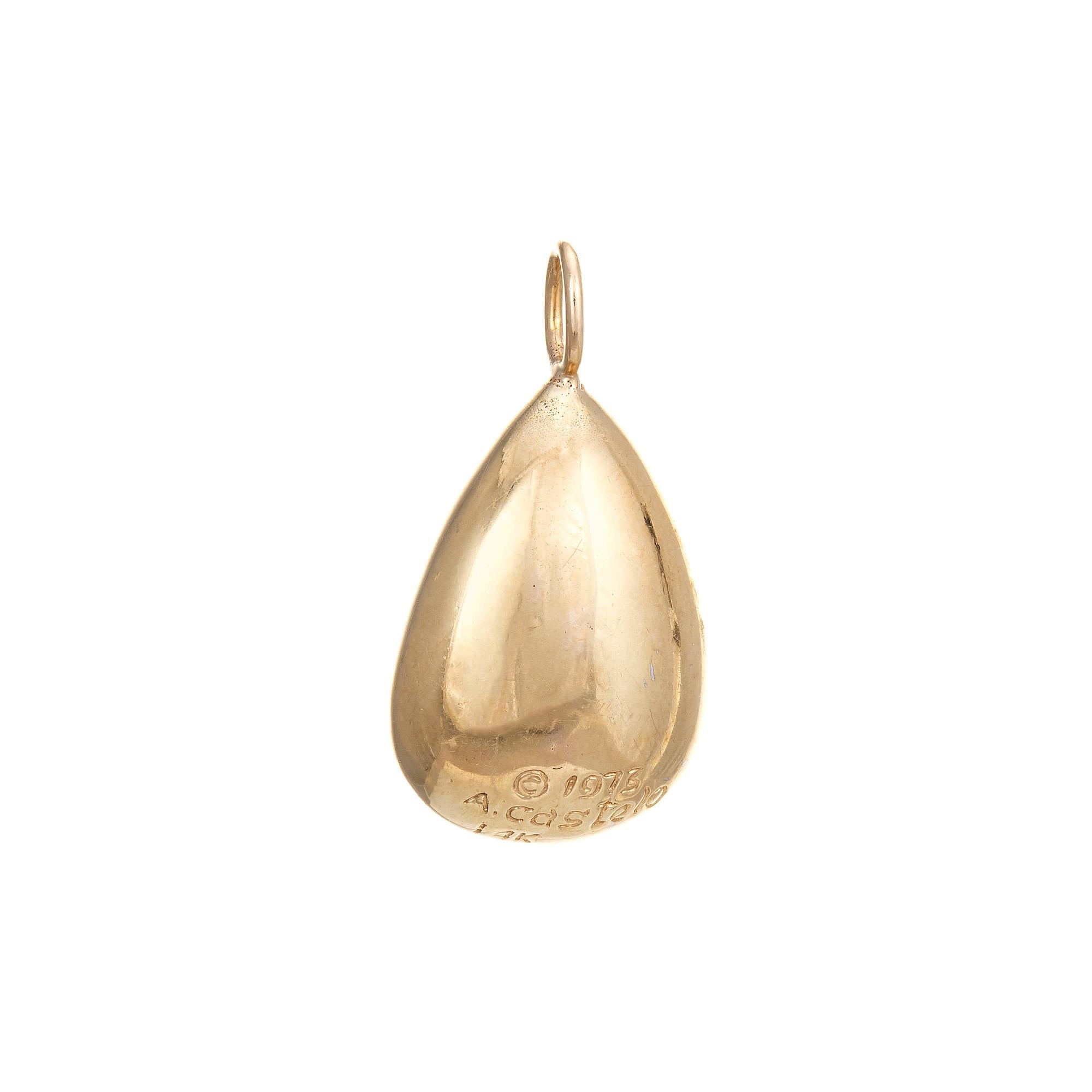 Finely detailed vintage diamond '&' sign pendant crafted in 14k yellow gold (circa 1973).

Diamonds total an estimated 0.07 carats (estimated at H-I color and SI1-2 clarity). 
The unique charm features a diamond set ampersand '&' symbol. The 