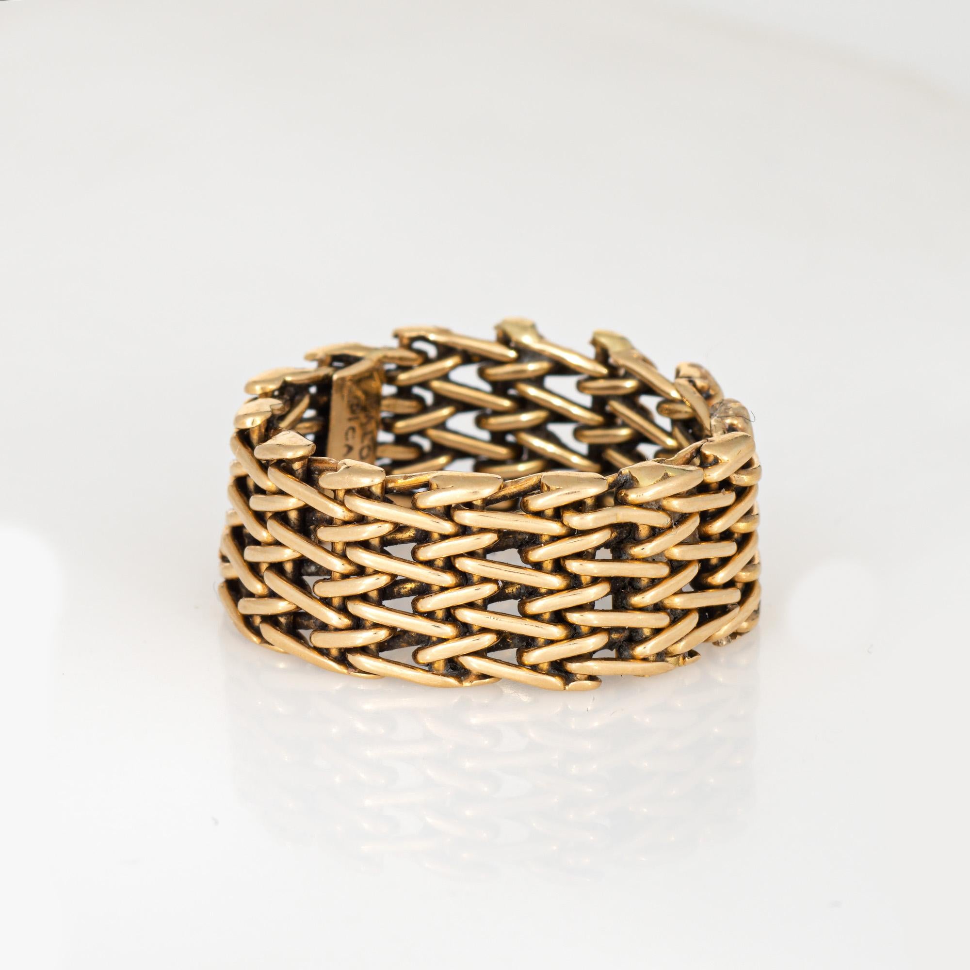Vintage Tiffany & Co mesh ring crafted in 18 karat yellow gold (circa 1980).  

The intricate mesh band is designed by Paloma Picasso and represents her early work for Tiffany & Co. The supple and flexible mesh design sits comfortably on the hand.