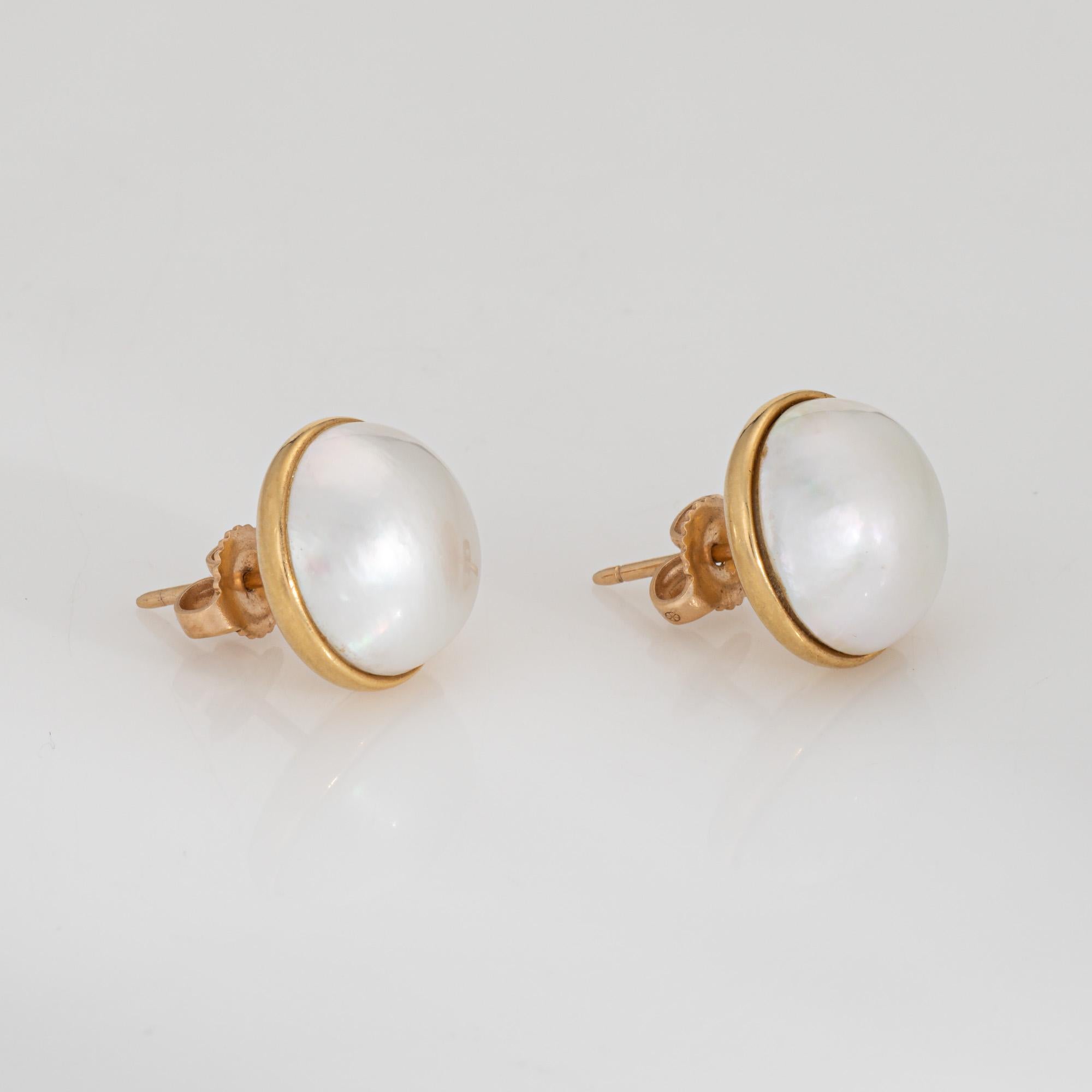 Finely detailed pair of vintage Tiffany & Co mabe pearl earrings crafted in 18k yellow gold. 

Mabe pearls measure approx. 13mm. Paloma Picasso created a number of iconic pieces during her tenure at Tiffany & Co. Dating to 1984 the earrings are a