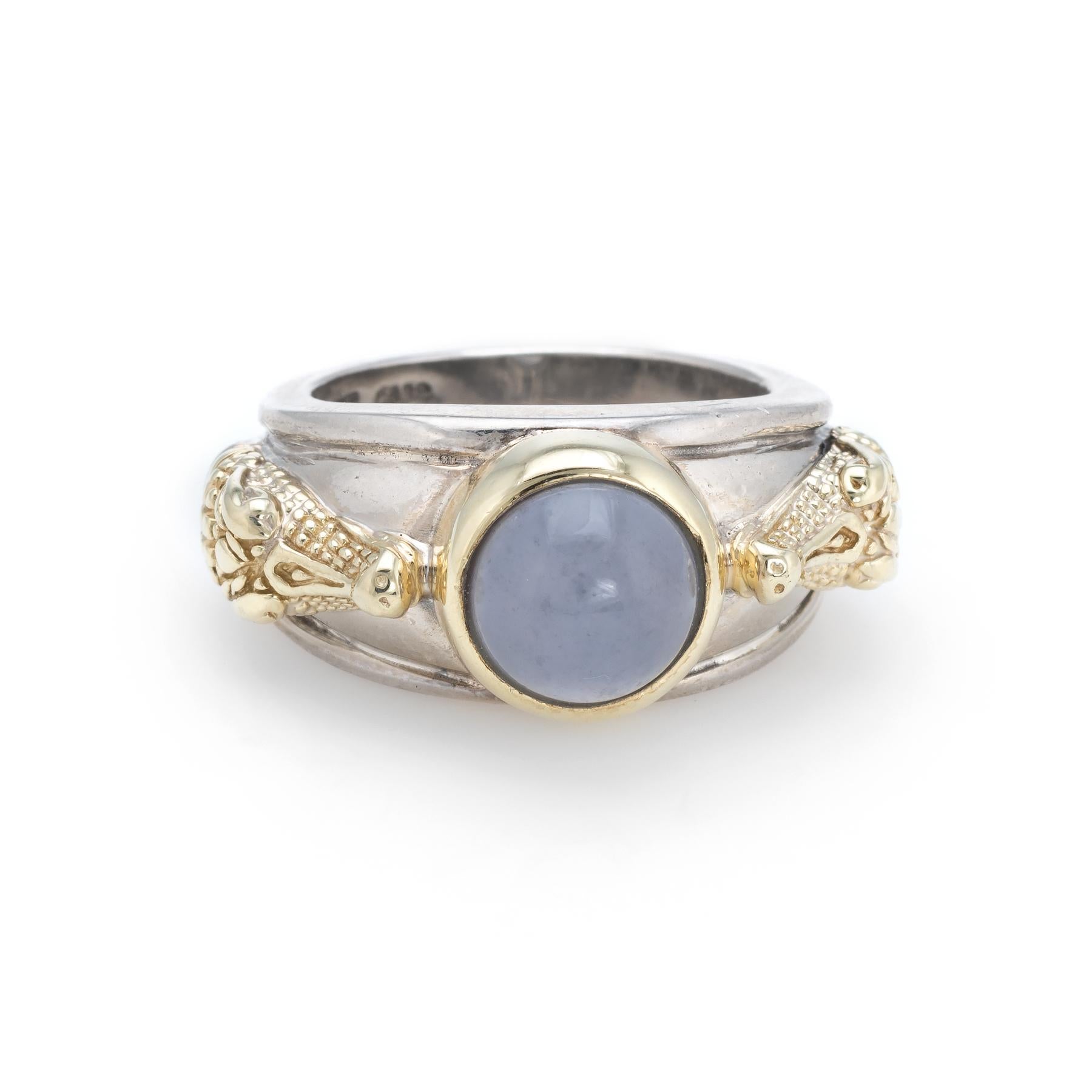 Estate Barry Kieselstein Cord blue chalcedony alligator ring, crafted in sterling silver and 14 karat yellow gold. 

Blue chalcedony is cabochon cut measuring 8mm. The chalcedony is in excellent condition and free of cracks or chips.

The ring is