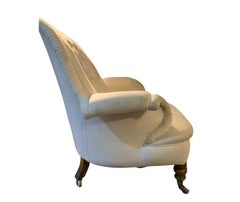 C19th Century Large English armchair with buttoned back scrolling arms