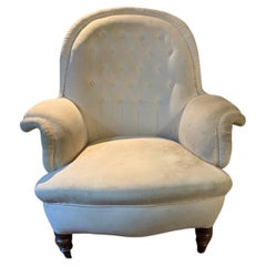 C19th Century Large English armchair with buttoned back scrolling arms