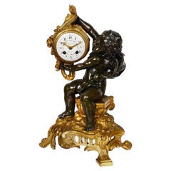Reloj de sobremesa francés de estilo clásico del siglo XIX con querubines, de 37 cm de altura