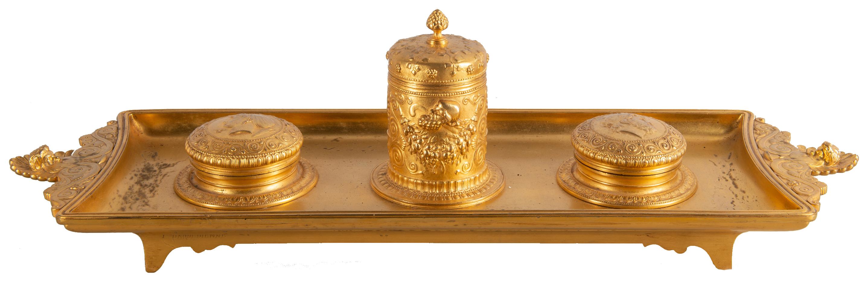 A good quality late 19th century French gilded Ormolu Gran Tour influenced gilded Ormolu ink well, having classing motifs and Roman Centurion bust embossed to the lids.
Stamped, Barbedienne.