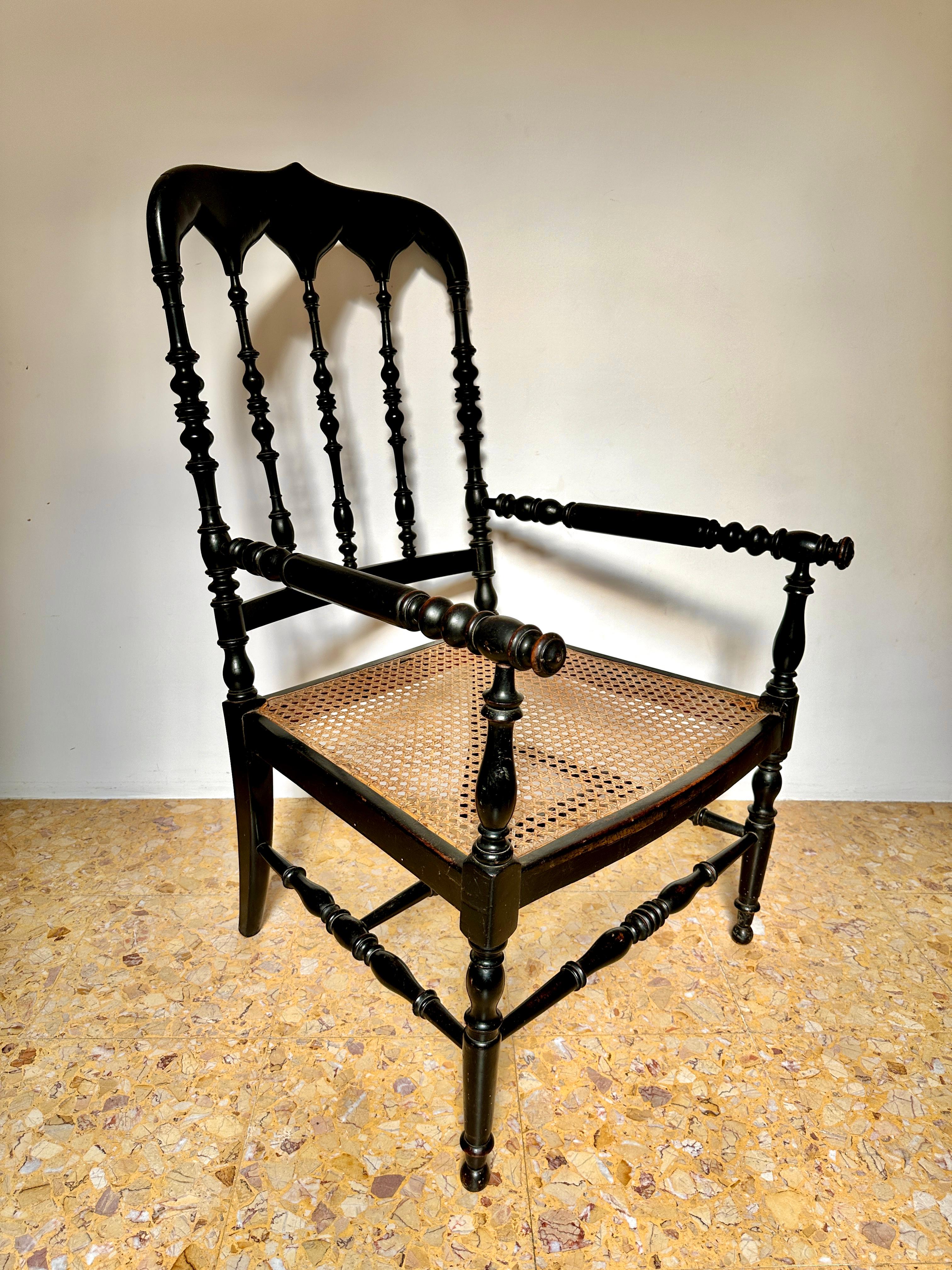 C19th Napoleon III ebonised cane seat armchairs (sold separately, four available).

Striking French Gothic Revival chairs with turned legs, stretchers, armrests and carved back. In very good, solid condition with some surface wear and the occasional