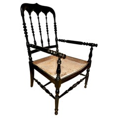 Fauteuils Napoléon III du 19e siècle à assise en rotin ébonisé (vendus séparément, quatre disponibles)
