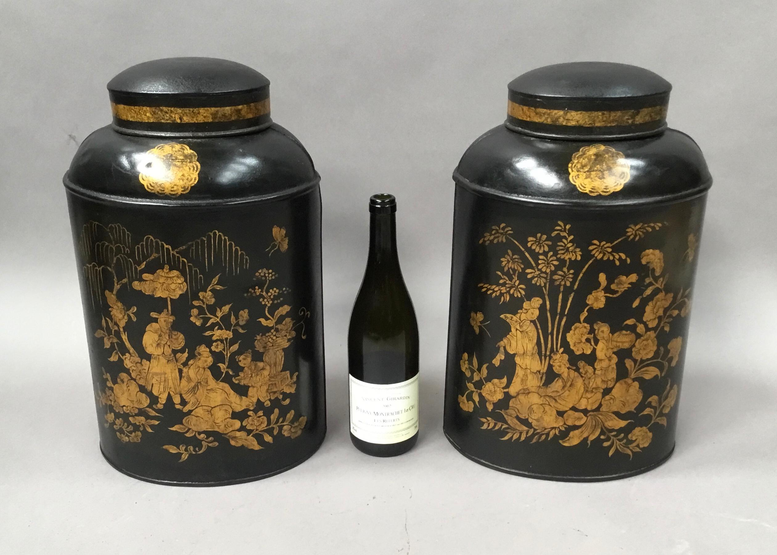 Good 19th century pair of chinoiserie lacquered tole tea canisters by John Bartlett; of unusual oval form and decorated in black and gilt. The domed tops retaining their original lids and numbered 1 and 4, the fronts depicting a different Chinese