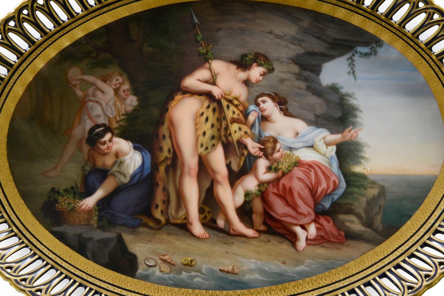 A fine quality late 19th century Vienna porcelain plaque depicting Bachus + Ariane. Having a pierced articulated gallery surround.

In the legend of Bacchus and Ariadne, the god Bacchus (Dionysus in Greek mythology) falls in love with Ariadne, a