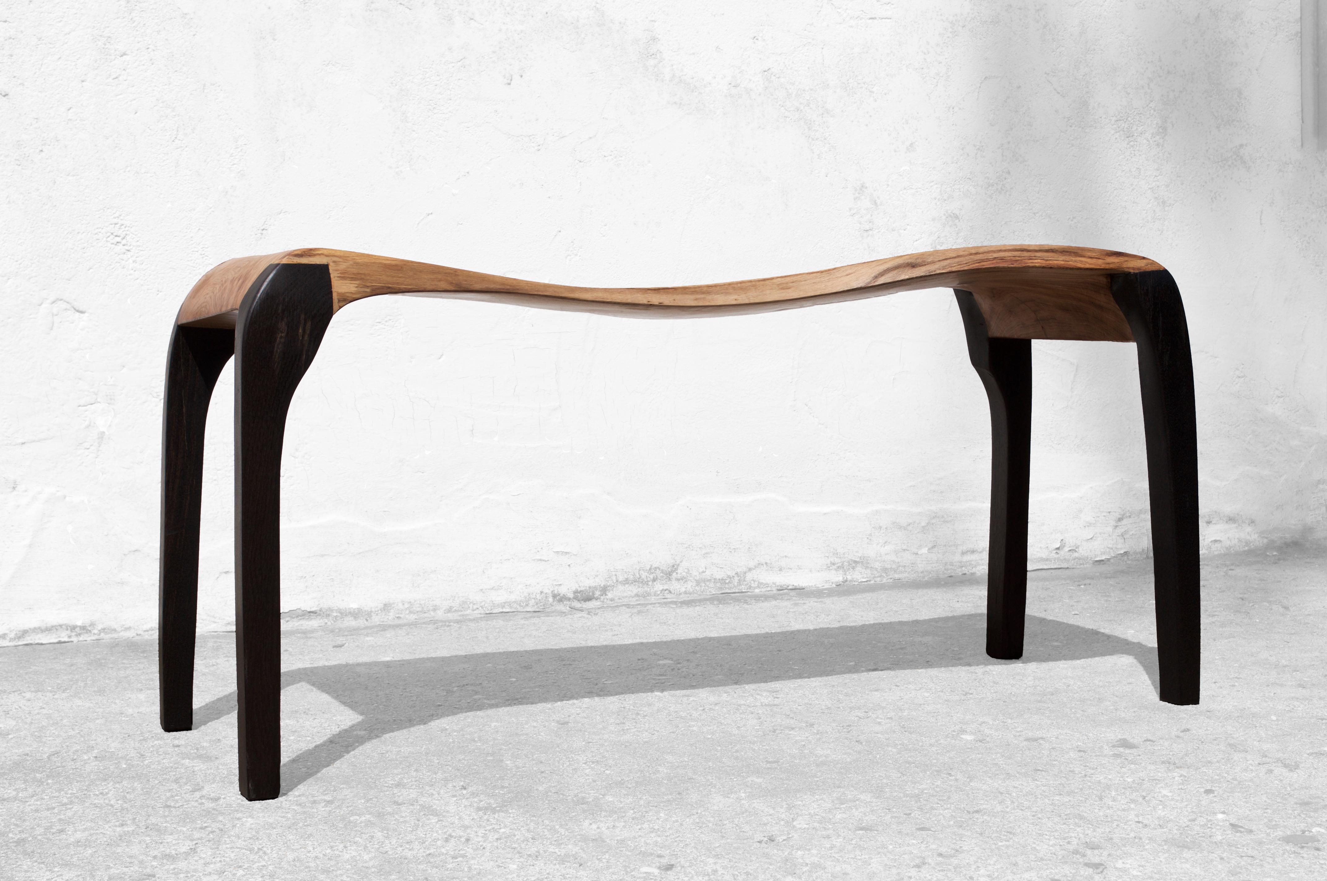 C2332 Console Table in Oak And Bog Oak Wood by Jörg Pietschmann
Dimensions: D 42 x W 120 x H 60 cm.
Materials: Oak and bog oak.

In Pietschmann’s sculptures, trees that for centuries were part of a landscape and founded in primordial forces tell