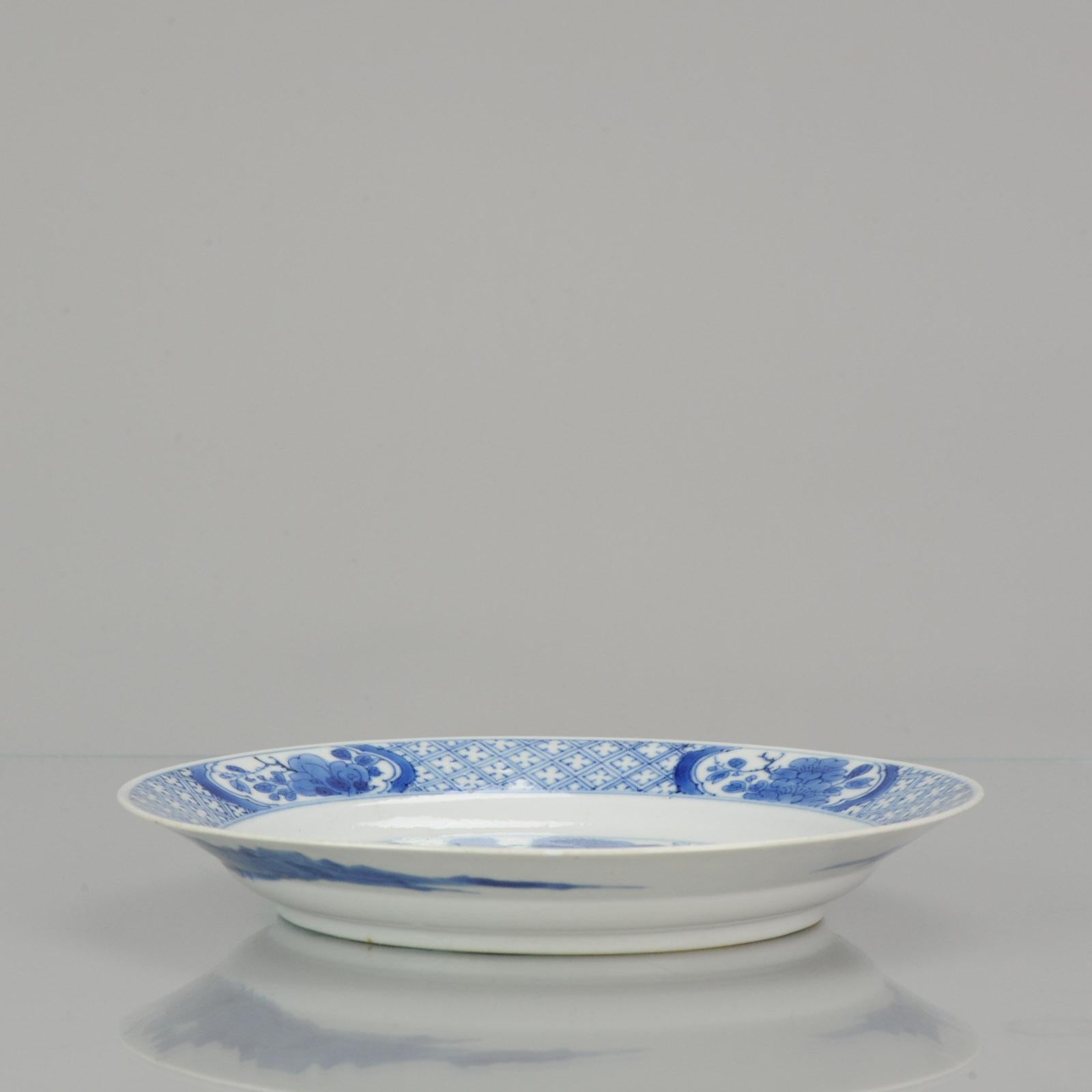 Nice blue and white porcelain plate, decorated with a nice garden scene. Chenghua marked at base but of Kangxi period.

Absolute top quality porcelain and painting.

All will be packed neat and sent track and trace airmail with insurance.