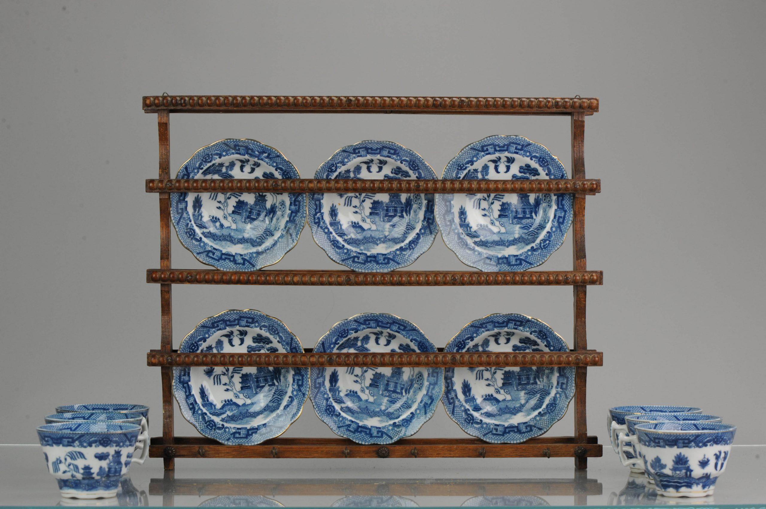 Very nice antique mosa tea set with hanger.

If placed on the wall the cups can be hanged on the wooden piece also with the metal rings. Very nice antique mosa plate from circa 1900. Decoration with flowers and figures.

Condition:
Overall