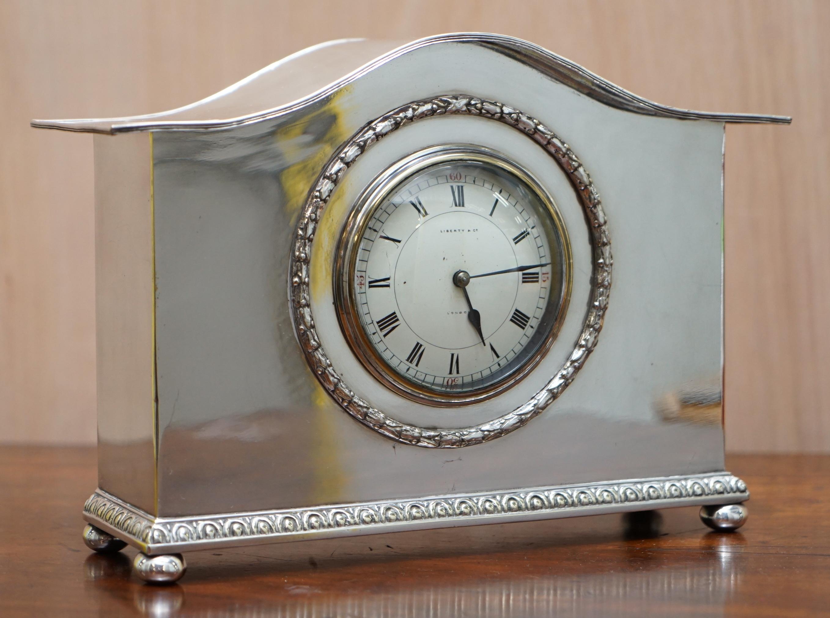 We are delighted to offer for sale this lovely Archibald Knox sterling silver plated Liberty & Co. London mantle clock

This clock is part of a suite, I have a Pewter enamel Knox Liberty carriage clock listed under my other items and two very rare