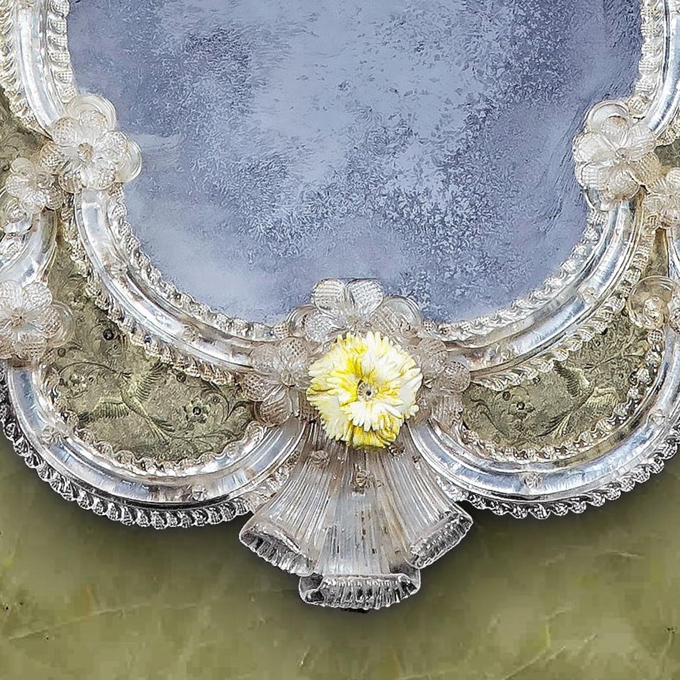 This piece of furniture is a reproduction of the typical Antique Venetian Mirror made in Murano glass, silvered with antique silvering entirely produced in mercury. This technique is typical of the 18th-century Venetian area. The entirely hand-made