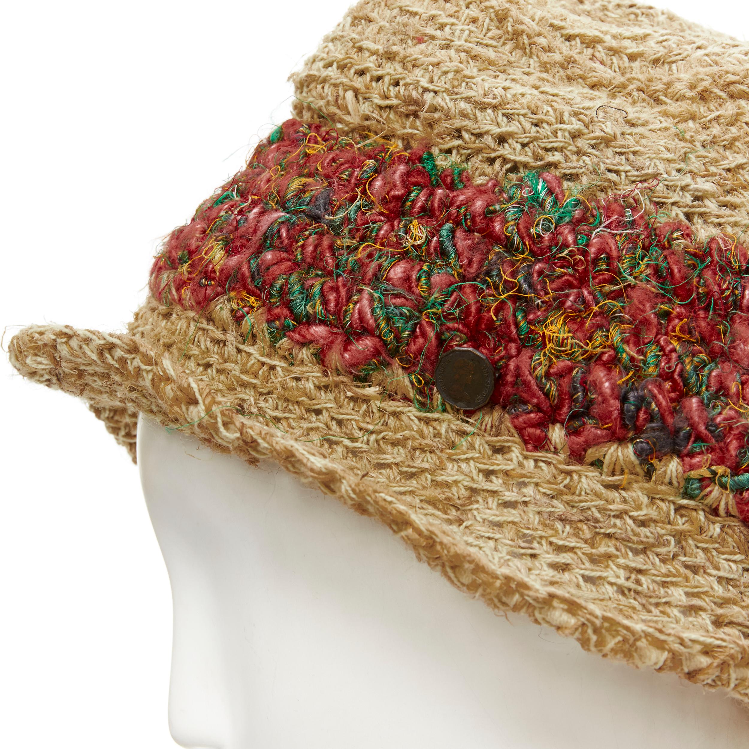 CA4LA raffia srtas natural brown red embroidery Penny coin charm bucket hat 
Reference: JETI/A00227 
Brand: CA4LA 
Material: Raffia 
Color: Brown 
Pattern: Solid 
Extra Detail: Pink and green tread embroidery band. Raw raffia straw hat. Wire brim.