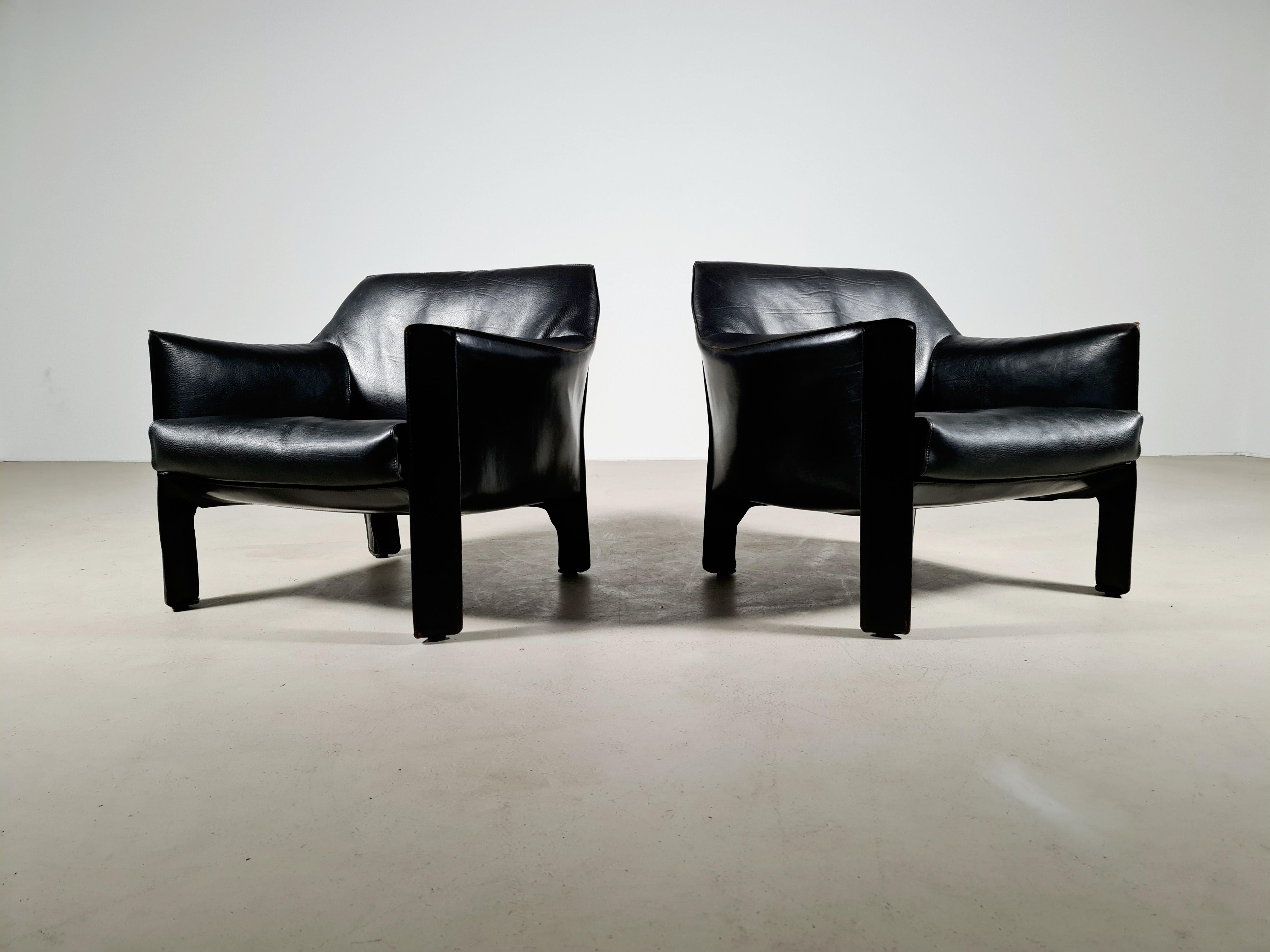 These beautiful and luxury original CAB 415 lounge chairs from the 1980's are designed by Mario Bellini for Cassina, Italy. The CAB chair has an enameled steel frame, the very strong buffalo leather upholstery is zippered over the frame. Extremely