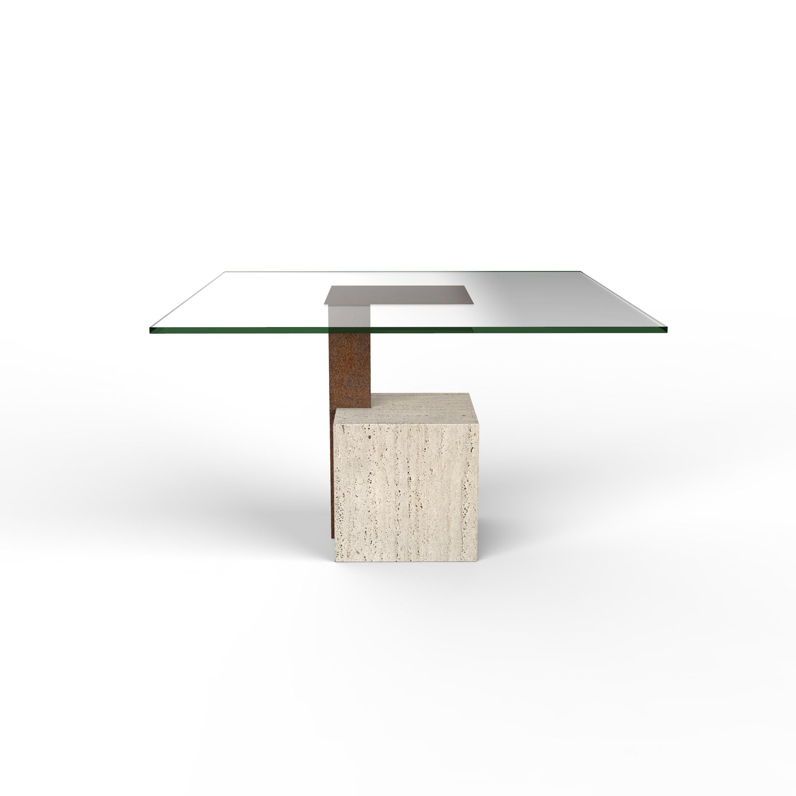 Cabal Bespoke Italian Travertine Marble Oxid Iron Joaquin Moll Dining Table
The Cabal dining table is a bold and architectural piece, handcrafted in Spain with a strong visual presence and refined materiality. At its core is a cubic base sculpted