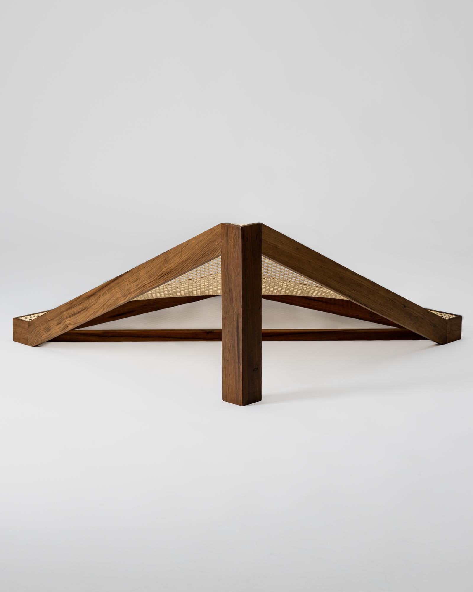 Cabana is a series that explores the limits imposed by the union of the rattan and its malleability with the stiffness of the wood, in order to create pieces in distortion and movement.  The wooden frames propose a break with the four-legged table