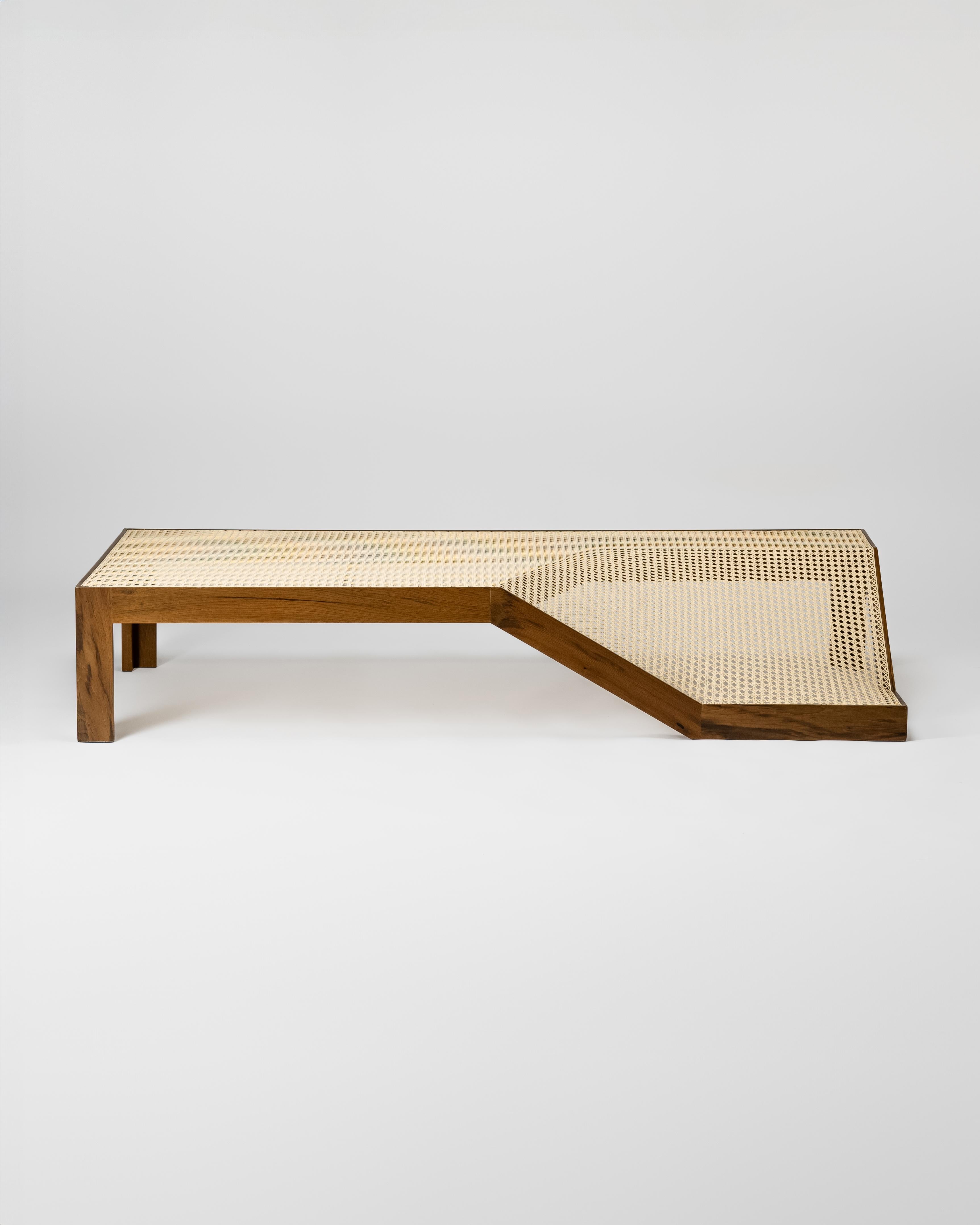 Cabana is a series that explores the limits imposed by the union of the rattan and its malleability with the stiffness of the wood, in order to create pieces in distortion and movement.

The wooden frames propose a break with the four-legged table