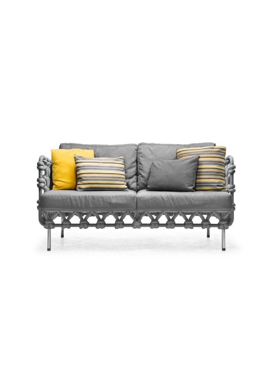 Cabaret loveseat highback by Kenneth Cobonpue
Materials: Acrylic fabric, reticulated foam, steel, wood, and stainless steel.
Dimensions: 78cm x 147cm x H 64cm

Cabaret wraps you in the warmth of its fabric layers like an oversized knit sweater.