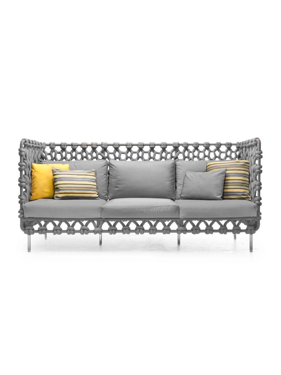 Cabaret sofa highback by Kenneth Cobonpue
Materials: Acrylic fabric, reticulated foam, steel, wood, and stainless steel.
Dimensions: 78cm x 214cm x H 100cm 

Cabaret wraps you in the warmth of its fabric layers like an oversized knit sweater.
