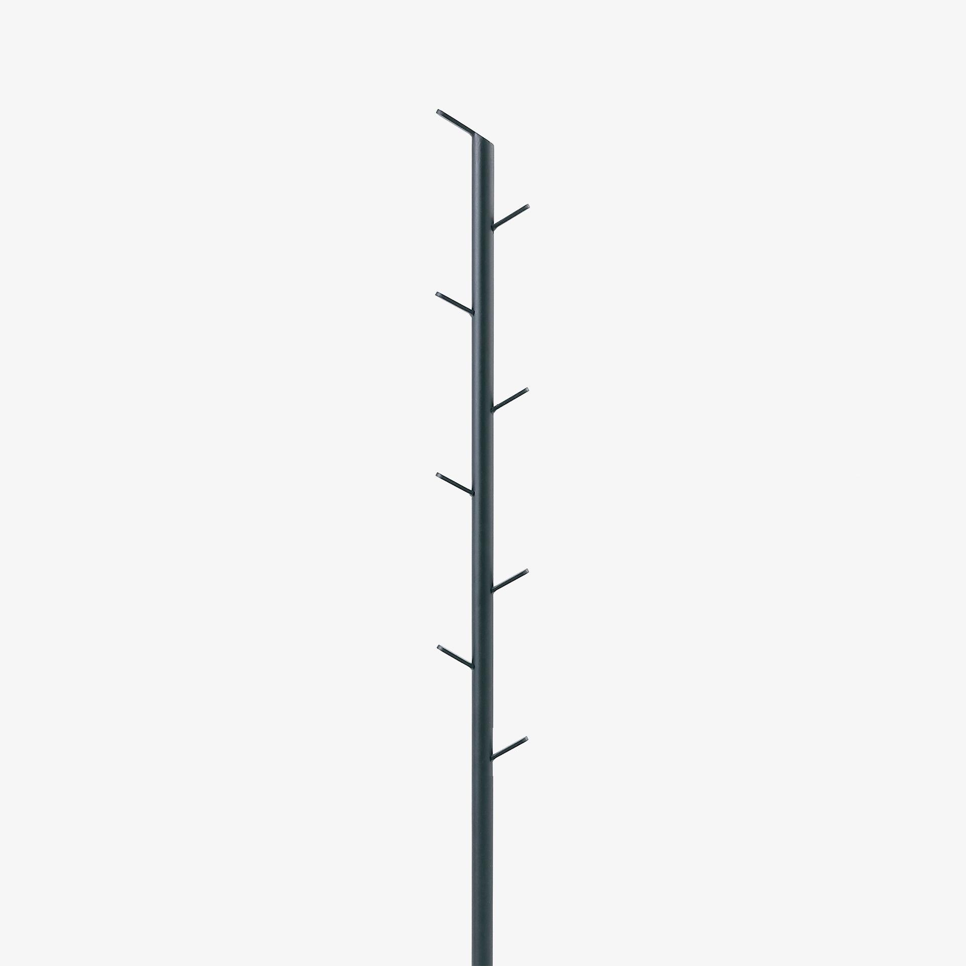 concrete base with carbon steel tree with matte black microtexture electrostatic painting