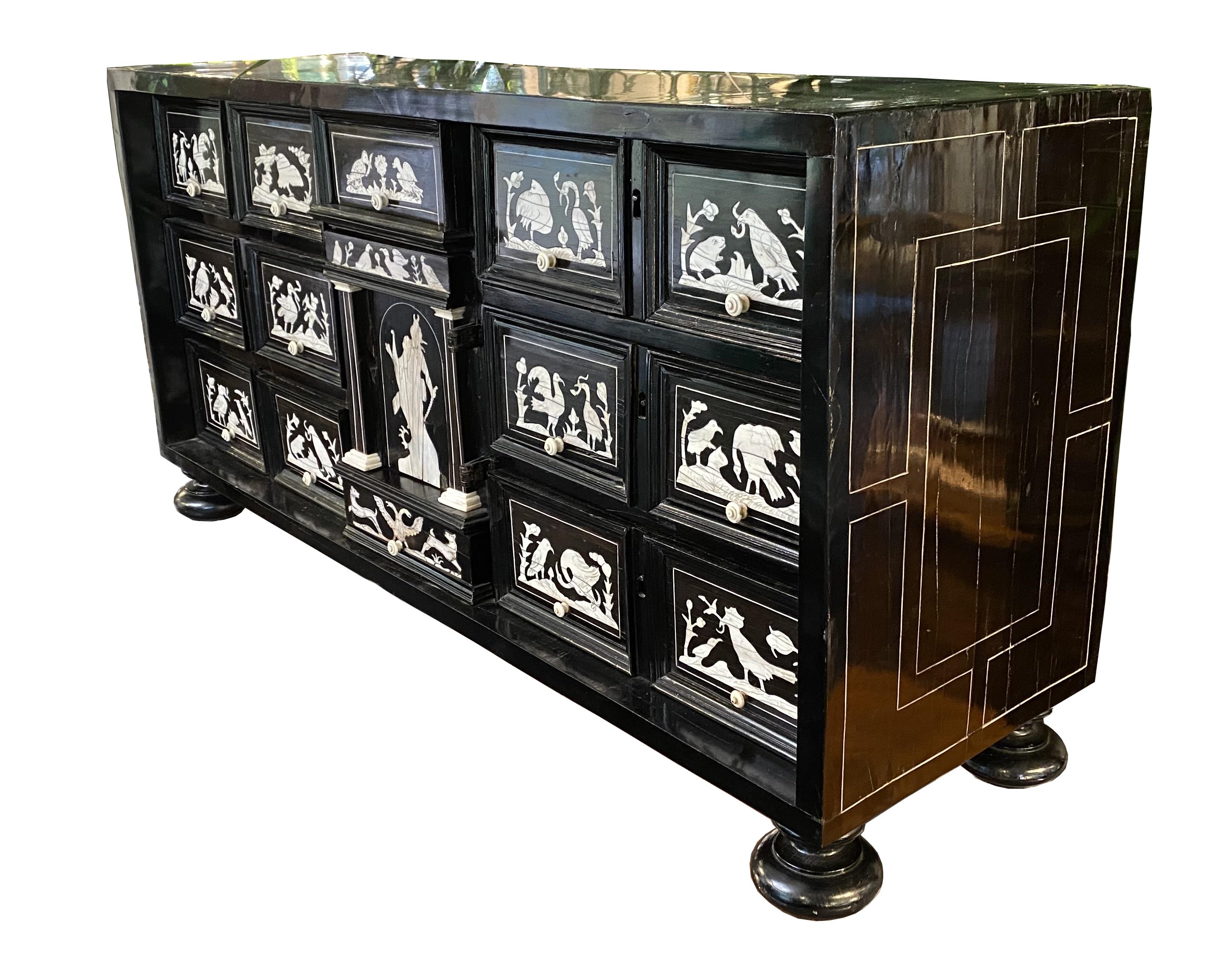 Italian Cabinet 17th century from northern Italy, ebony veneer and ivory inlay For Sale
