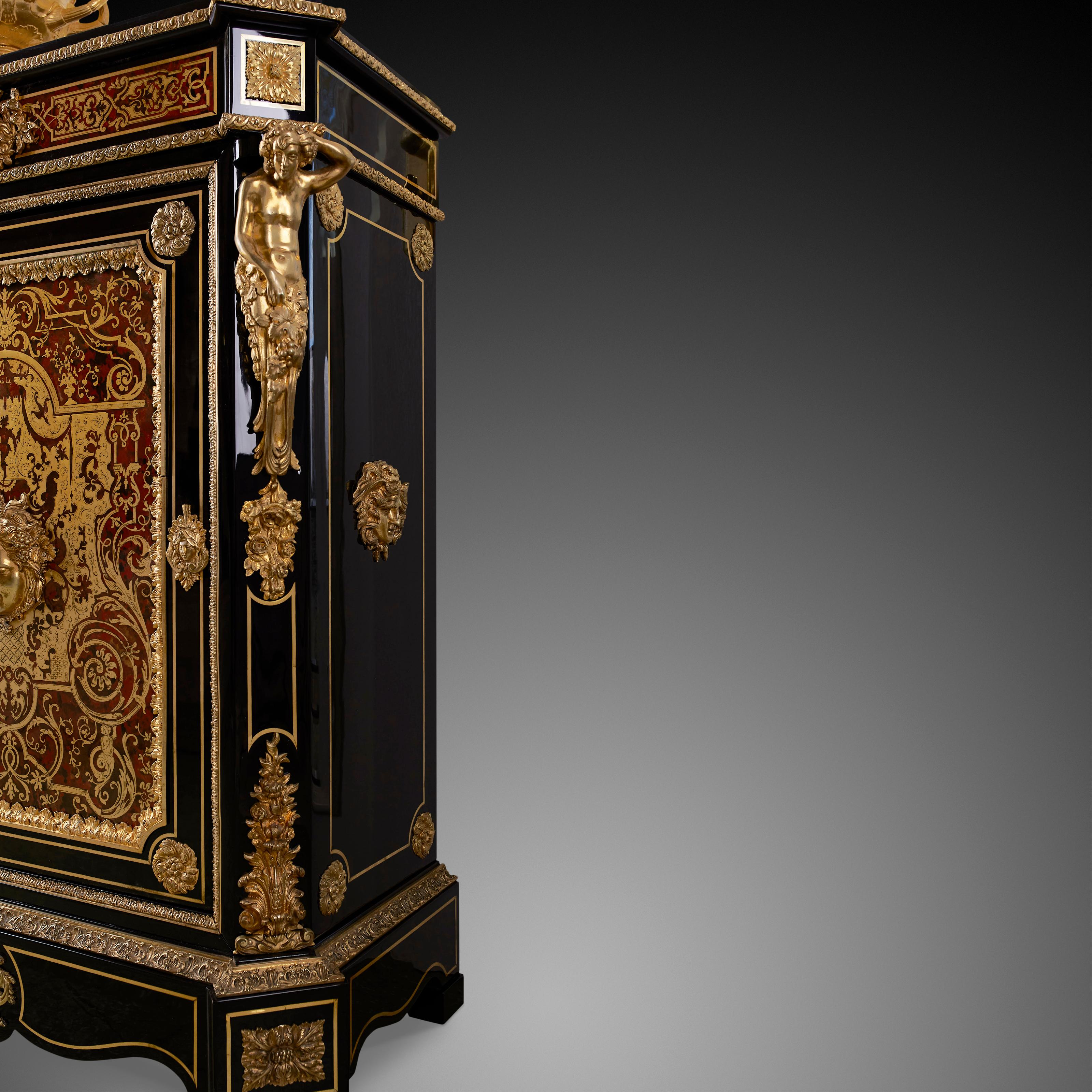 This wooden cabinet is designed in the Boulle style. This style was very popular around the time of Napoleon III. The characteristic of this style is the use of small pieces of wood in furniture, inlaid designs with many different materials: