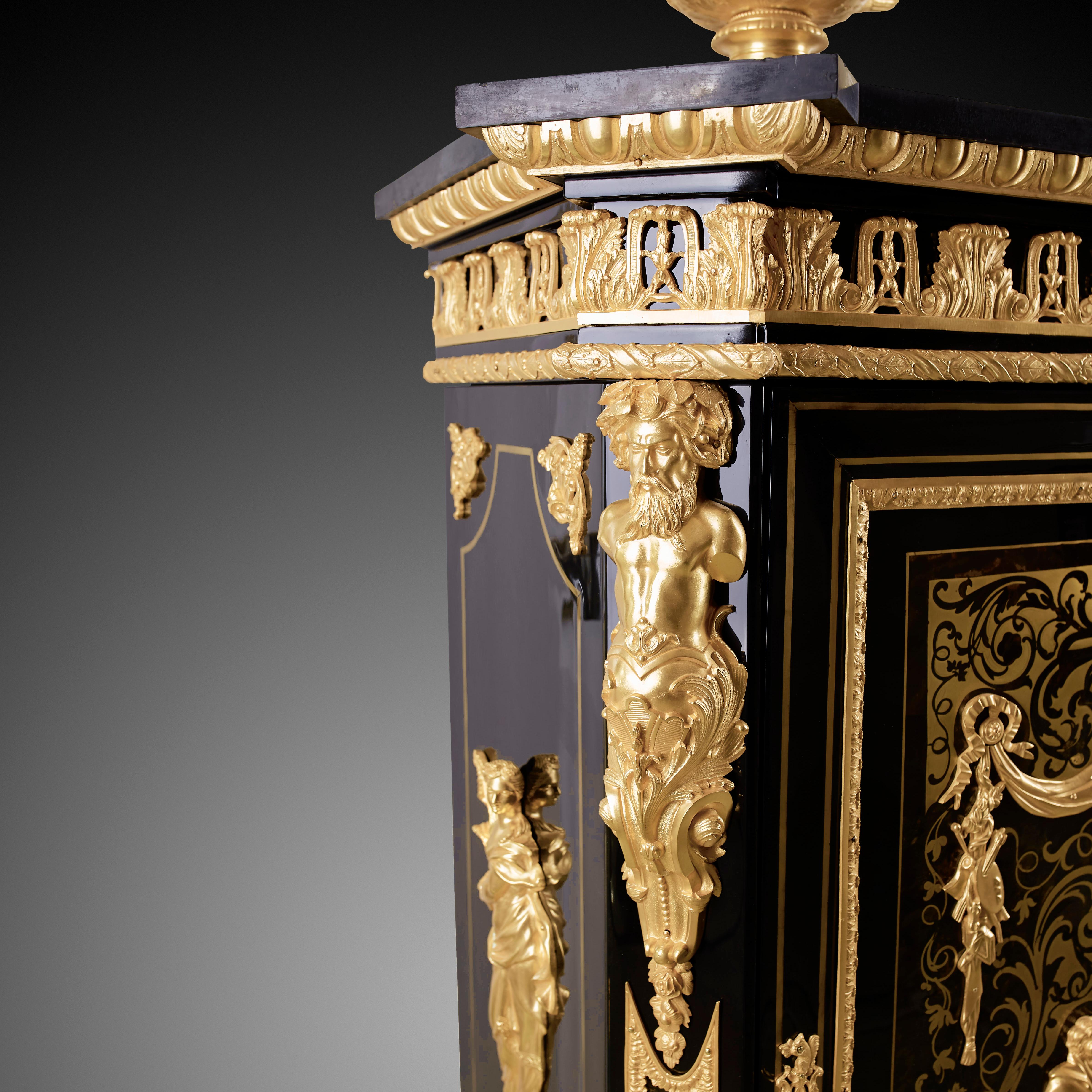 This Napoleon III Style cabinet is made of black polished wood, mounted with gilt bronze, inlaid with brass and resting on top is a plate of Belgian black marble. The Napoleon III style, named after Louis-Napoleon Bonaparte, the French emperor who