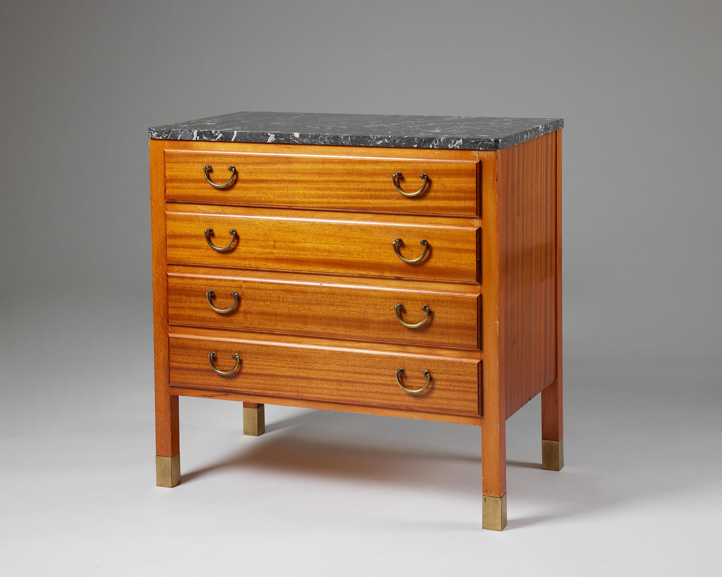 Cabinet, anonymous,
Sweden, 1940s.

Mahogany, beech, marble and brass.

Dimensions:
H: 70 cm / 2' 3 1/2''
W: 71 cm / 2' 4''
D: 42 cm / 16 1/2''