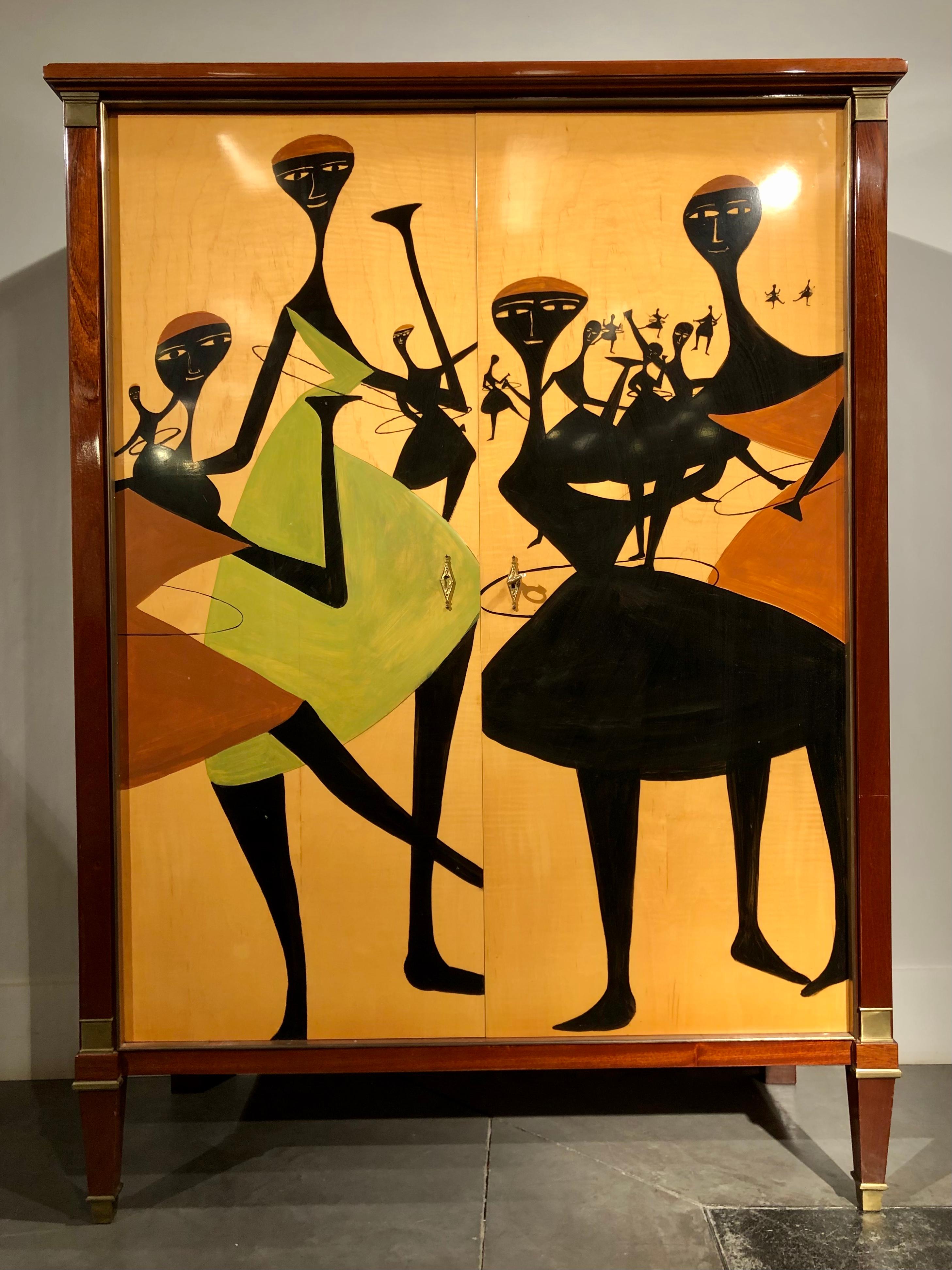 Extremely rare furniture by De Coene with a painted decor on the two doors.
This cabinet must have been executed at the end of the fifties around 1958 and represent women dancing with hula hoop.
The name of the person who has commanded the cabinet