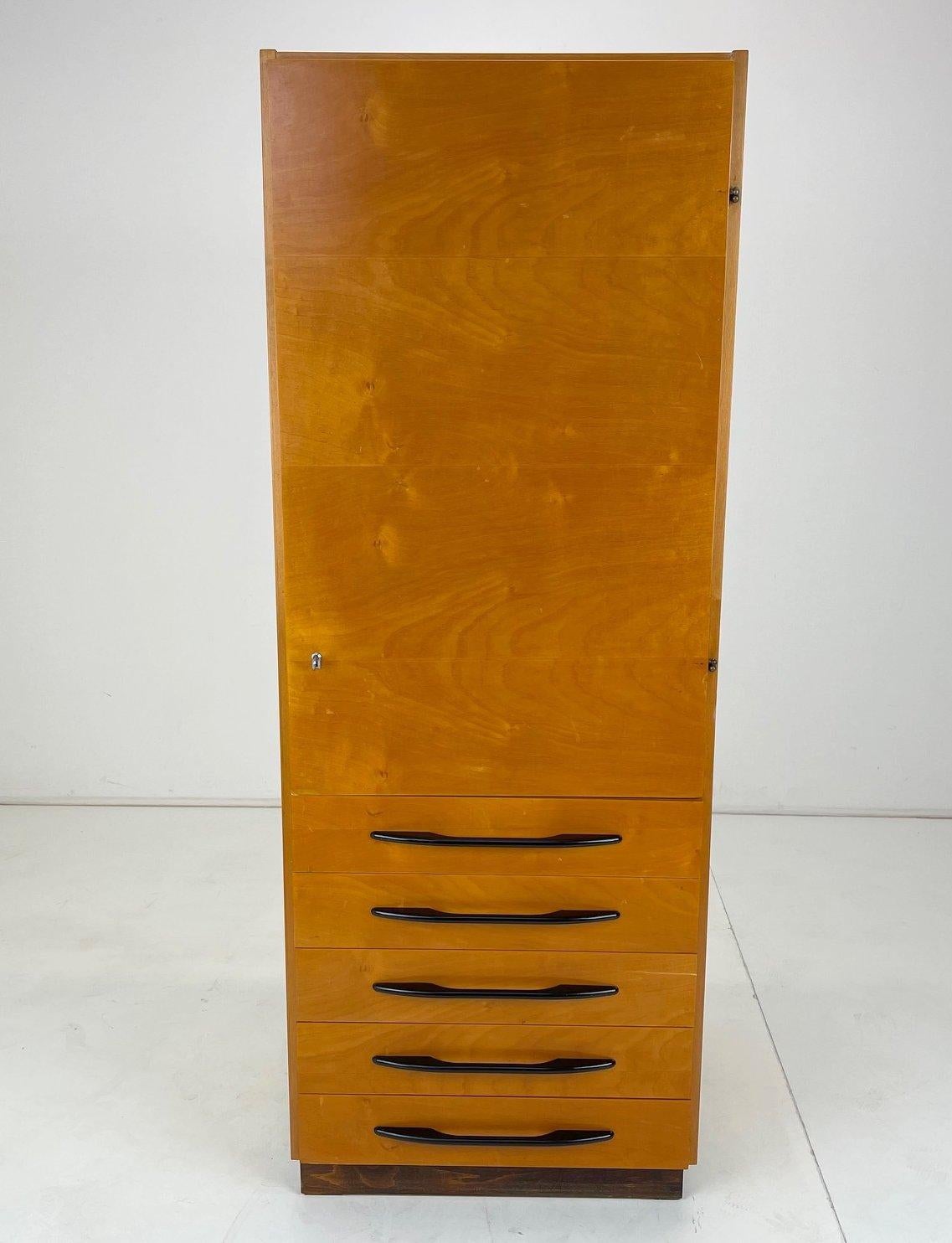 Vintage cabinet designed by architect Mojmír Požár and produced in UP Závody in former Czechoslovakia in the 1950's.