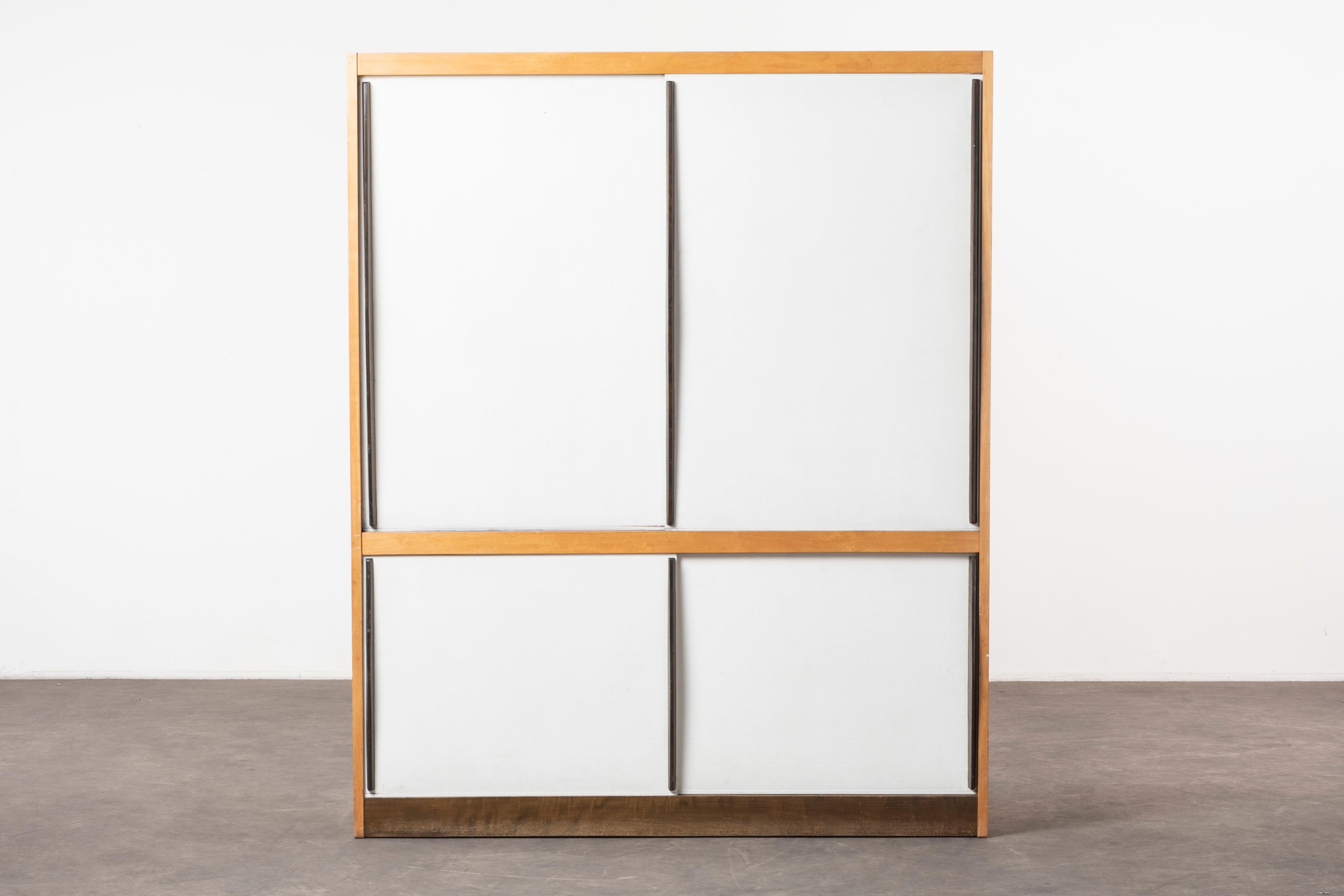 Cabinet by Hans Bellman,
Switzerland, 1946. Manufactured by Wohnbedarf. Birch wood structure, metal sliding doors. Measures: 120 x 45 x H 148 cm. 47.2 x D 17.7 x H 58.2 in.
Please note: Prices do not include VAT. VAT may be applied depending on