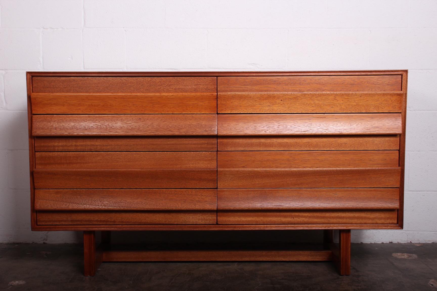 A mahogany chest of drawers designed by Paul Laszlo for Brown Saltman.