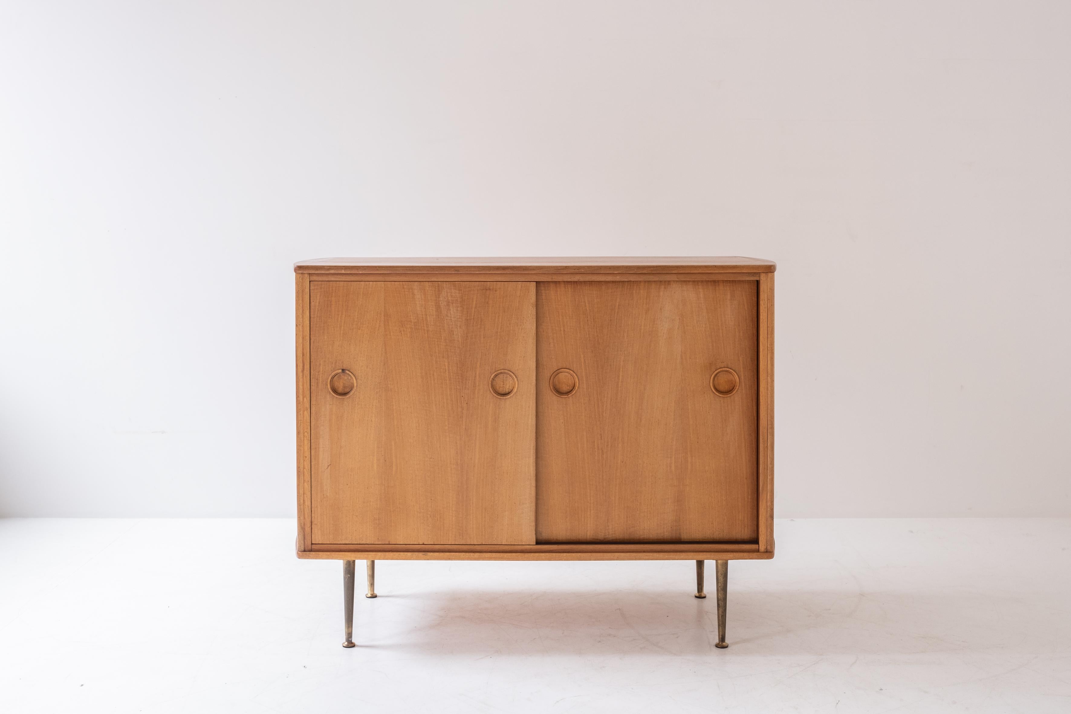 Cabinet designed by William Watting for Fristho Franeker, The Netherlands 1950’s. This cabinet is made out of walnut and has a matching vitrine cabinet on top. Well presented original condition.