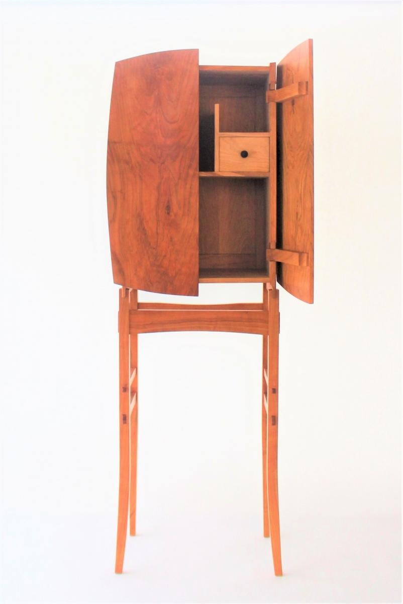 This present but very quiet-looking cabinet Cabinet is a celebration of simplicity. Through subtle lines and minimal design language, the wood and the connections are given the space to tell their story. Due to the subtle curves in the design