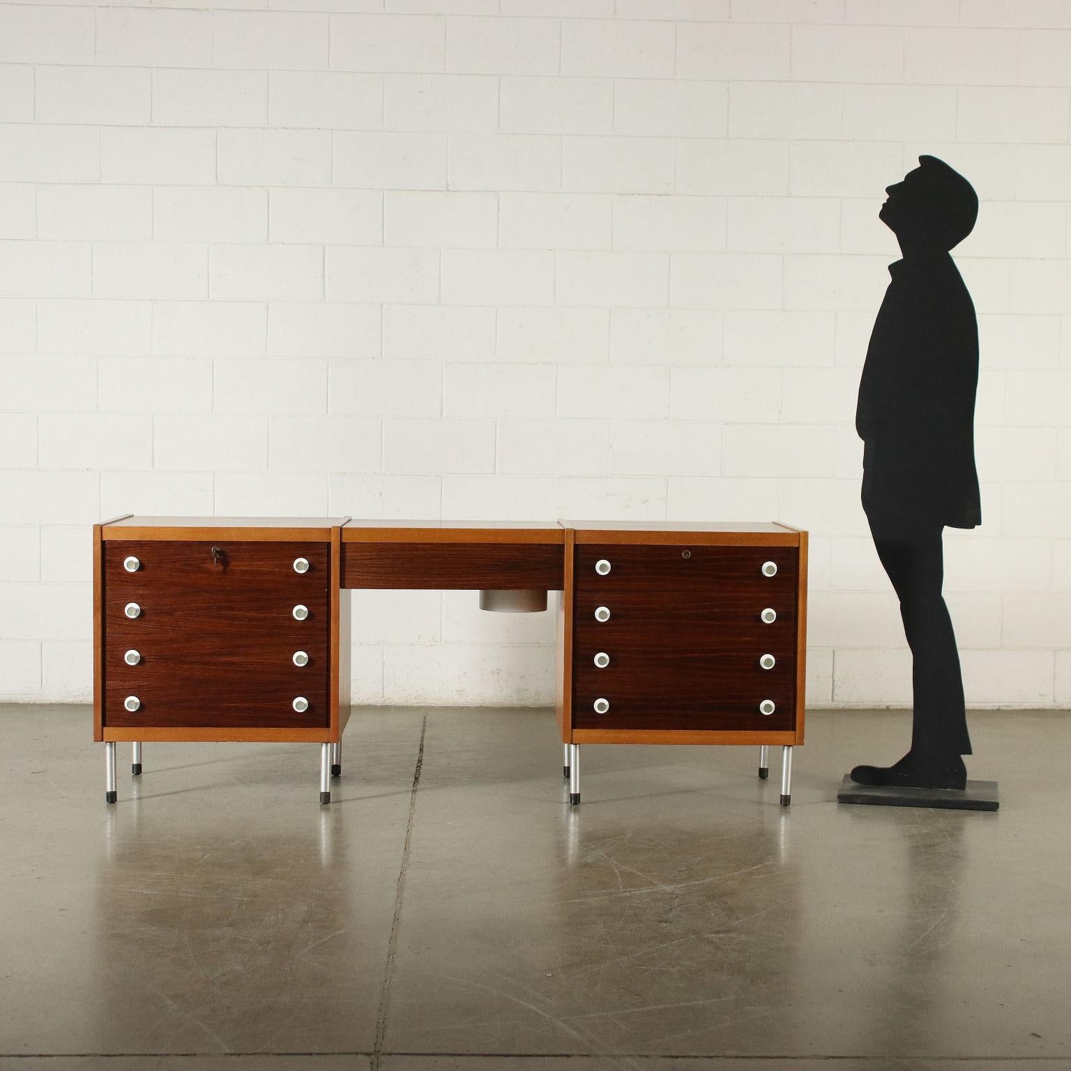 Chest of drawers with drop-down dressing table, central. Veneered wood, metal legs and handles.