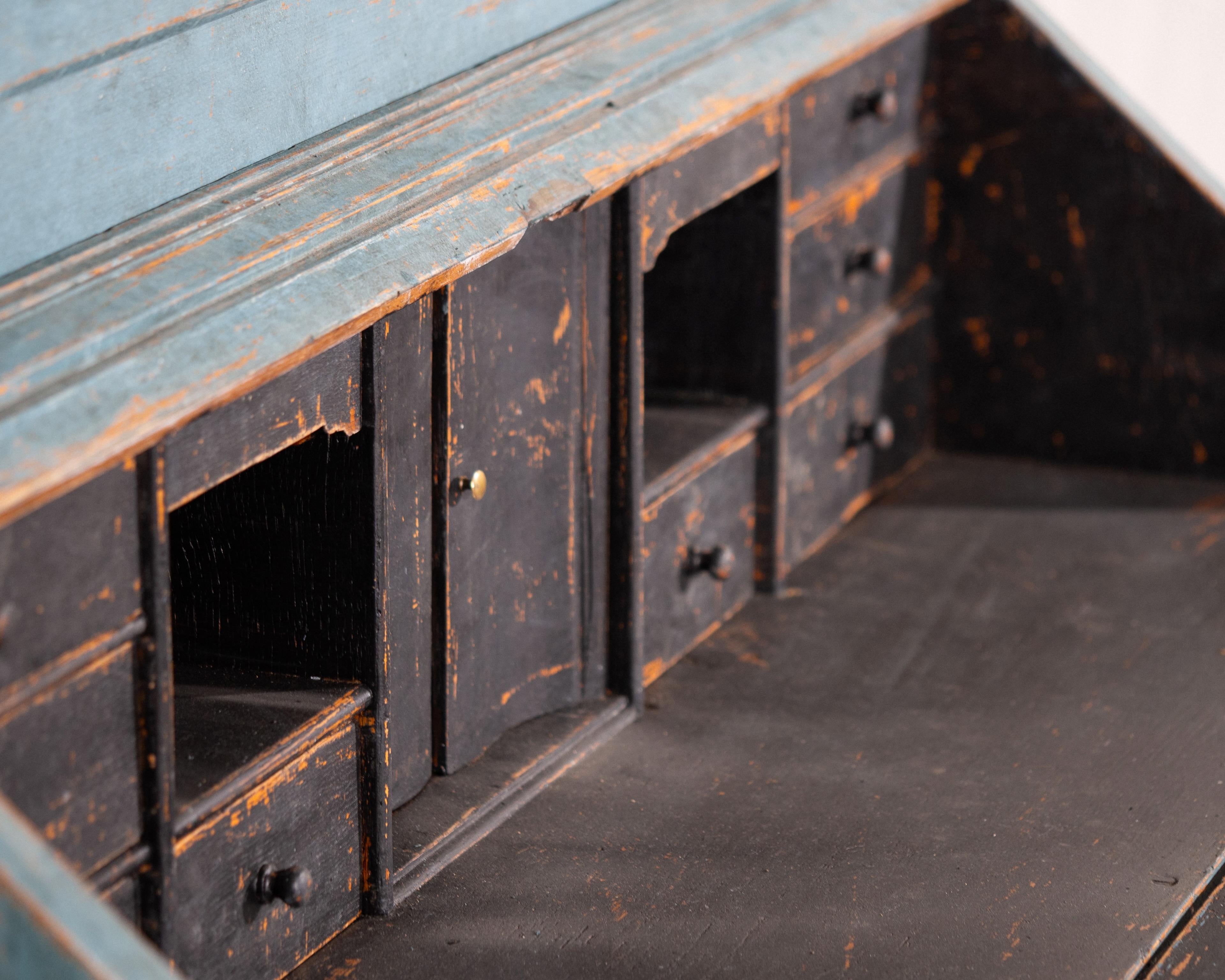 20th Century Cabinet in a beautiful bluish colour with many carvings, circa 100 years old. For Sale