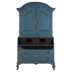 Vintage Cabinet in a beautiful bluish colour with many carvings, circa 100 years old.