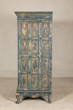 Cabinet in Blue Patina with Carved Doors and Cabriole Legs