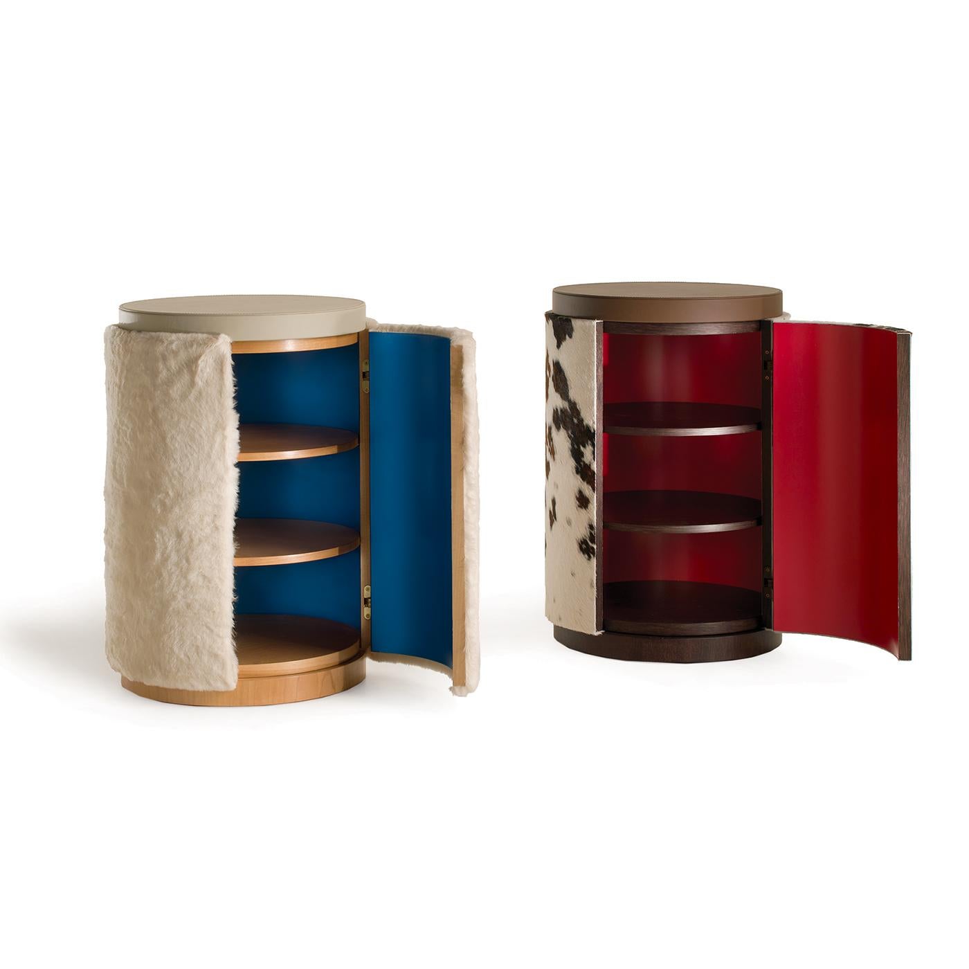 Combining the luxurious feel of fur with an environmentally friendly faux fur material, this cabinet will imbue with elegance a rustic or modern interior, while also equipping it with unique storage space. Unconventionally shaped as a cylinder, this