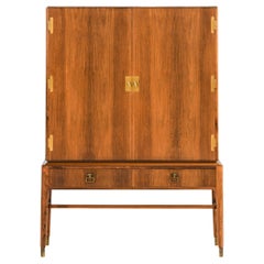 Mobile in palissandro e ottone di Ernst Kühn, anni '40