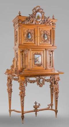 Cabinet in Walnut Molded and Carved with Enamelled Plates Decoration