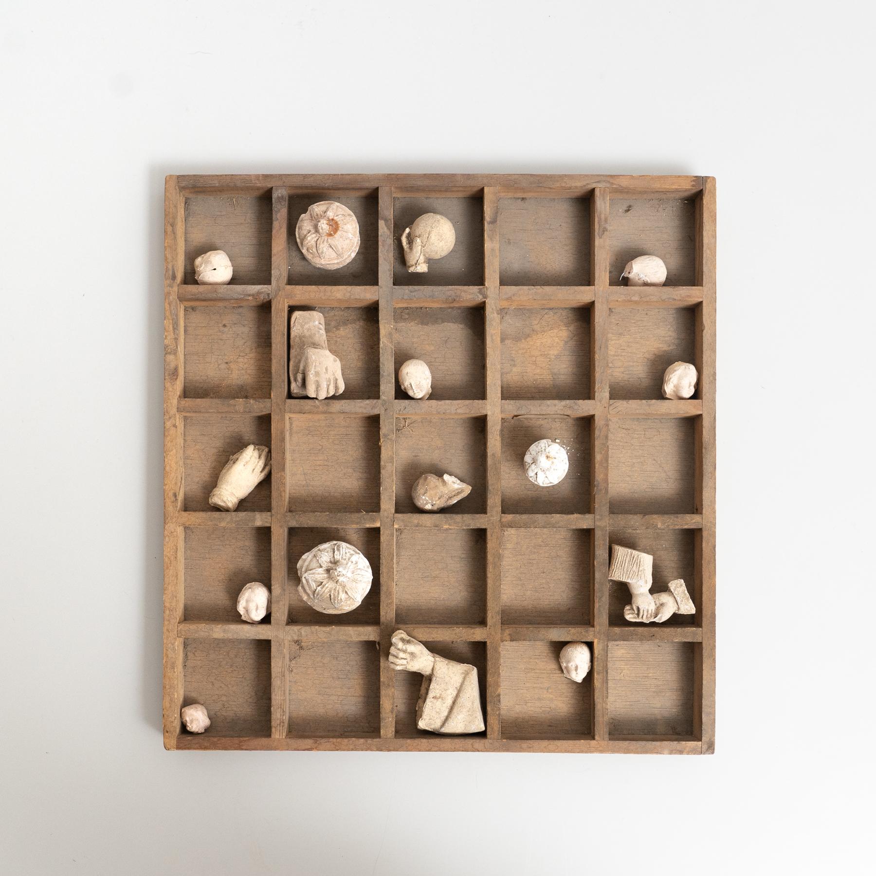 Exquisite cabinet of Curiosities showcasing a stunning collection of plaster figures and pieces, reminiscent of a Classic sculpture museum.

Olot has been a hub for sculpture and religious imagery production since the 19th century, with notable