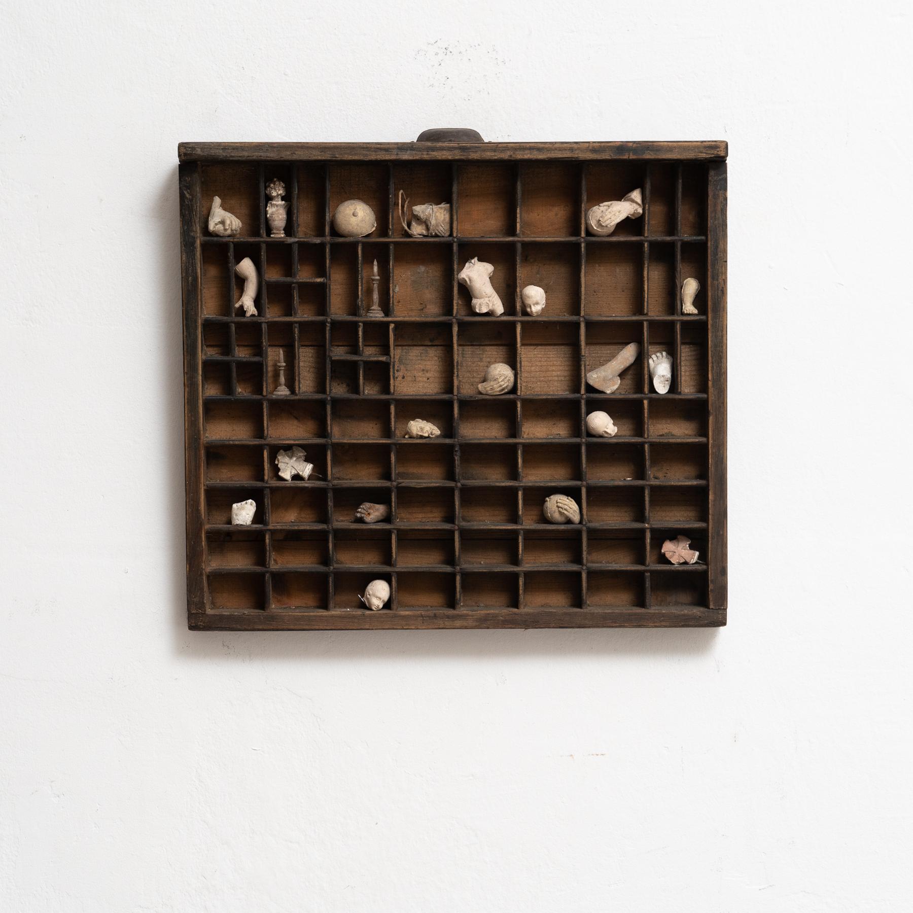 Exquisite cabinet of Curiosities showcasing a stunning collection of plaster figures and pieces, reminiscent of a Classic sculpture museum.

Olot has been a hub for sculpture and religious imagery production since the 19th century, with notable