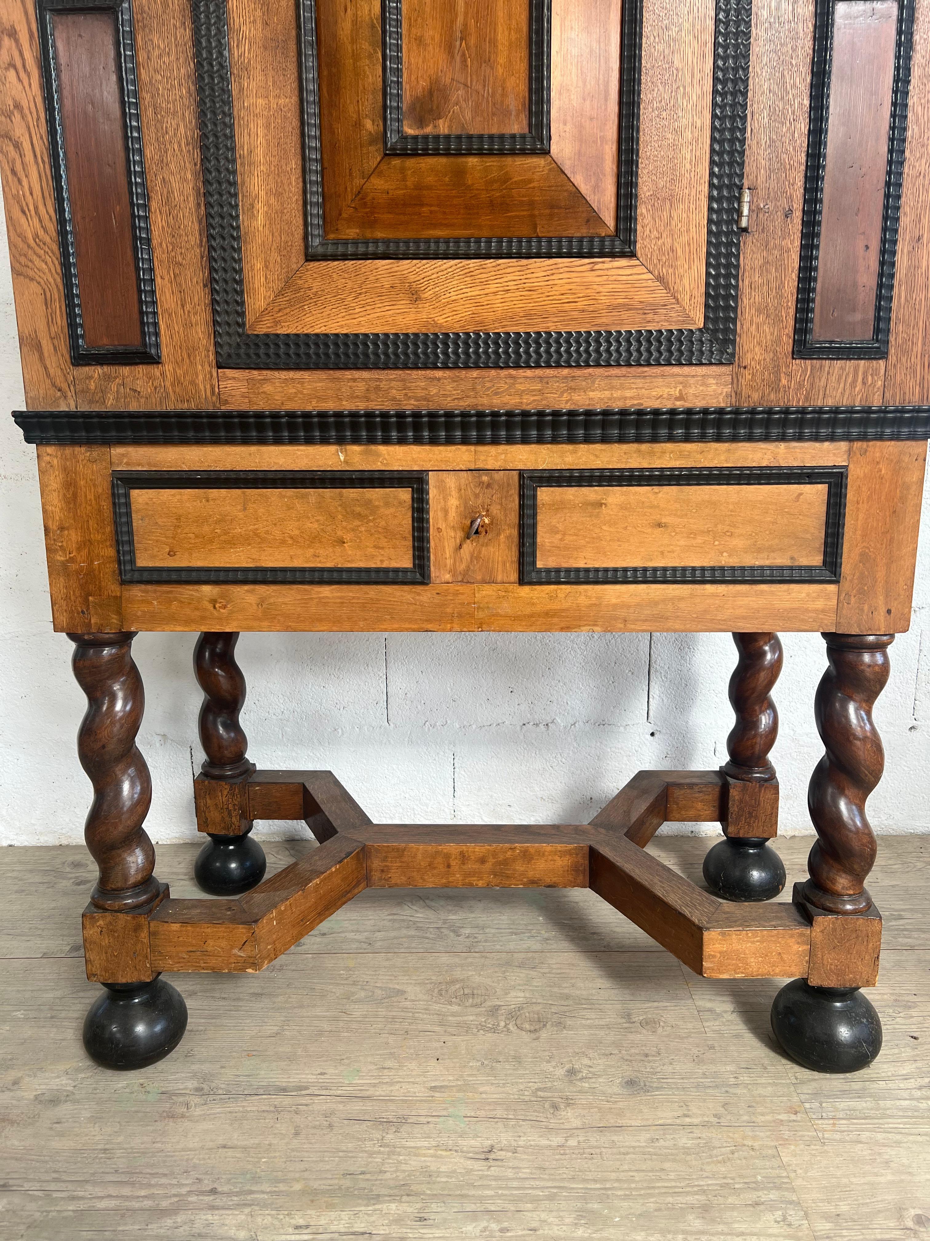 Hand-Crafted Cabinet On Base With Twisted Columns For Sale