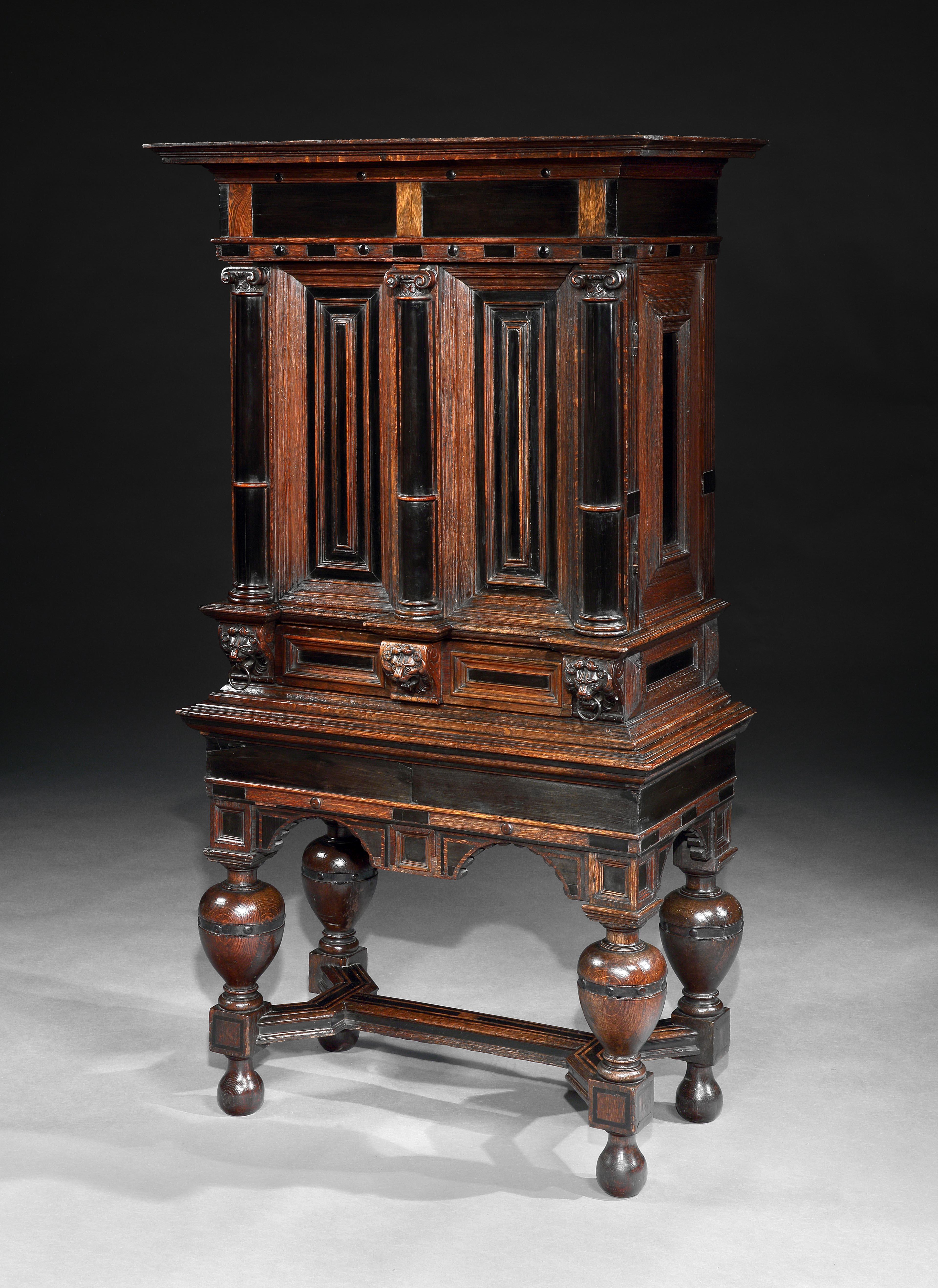 During the 17th century cabinets, along with a richly furnished bed, were the most important pieces of furniture in a Dutch home. This charming small cabinet would have either been placed in the Hall, which was the most important room in the house