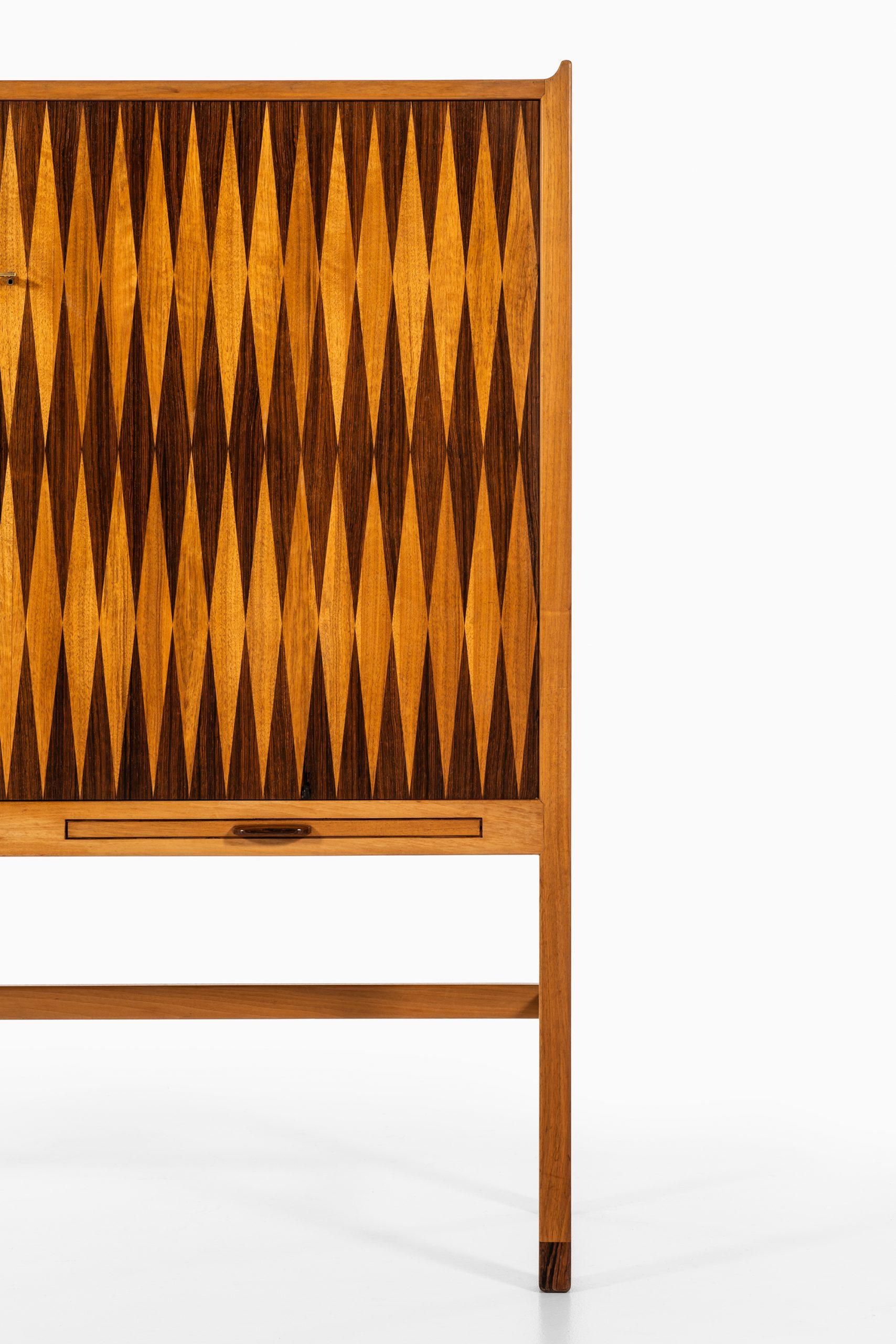 Rare cabinet with backgammon style inlays by unknown designer. Probably produced in Denmark.
