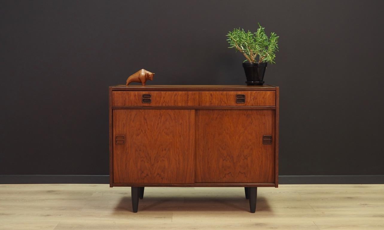 Phenomenal cabinet from the 1960s-1970s, Scandinavian design - Minimalist form. Furniture finished with rosewood veneer. Spacious drawers, shelf behind a sliding doors. Maintained in good condition (minor bruises and scratches) - directly for