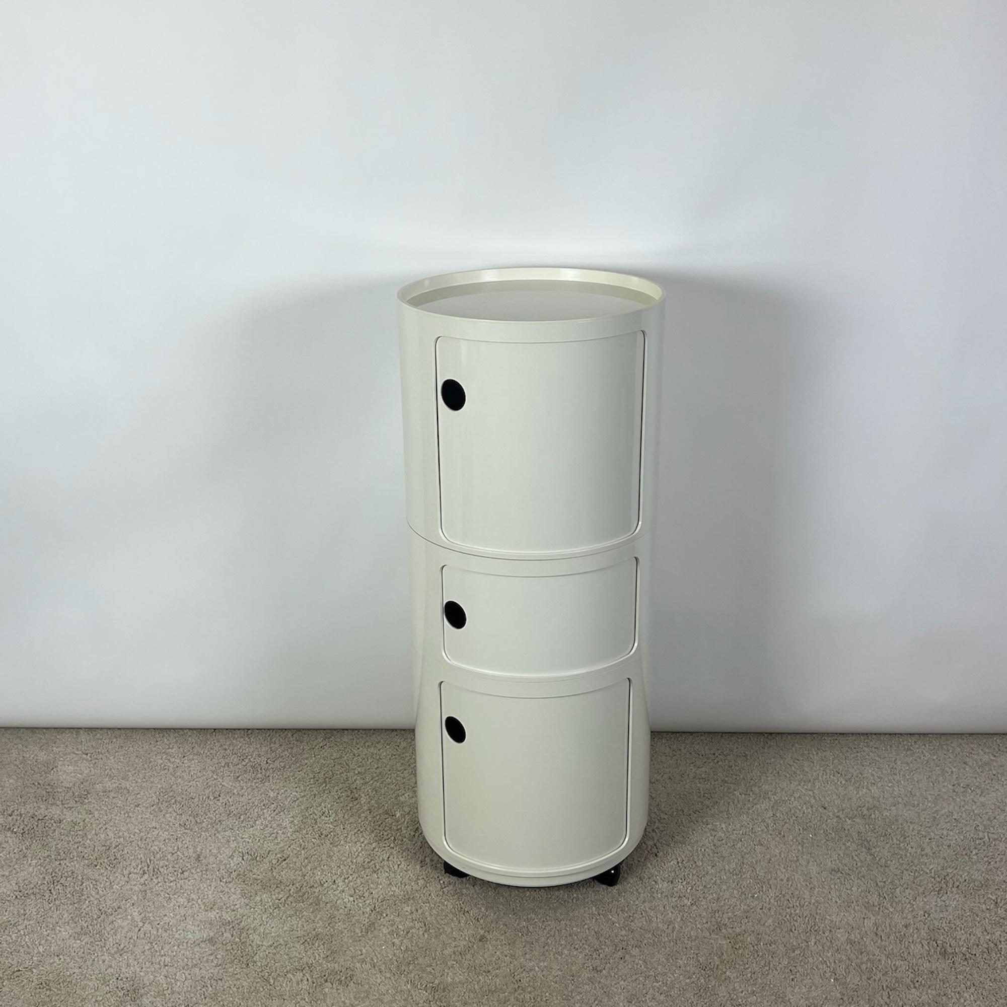 ORDER
NOW
Ultra rare round storage cabinet column on wheels designed by Anna Castelli Ferrieri and manufactured by Kartell in the 60s.

This column is composed of three round modules with curved doors – two with 39 cm height and one with 21 cm