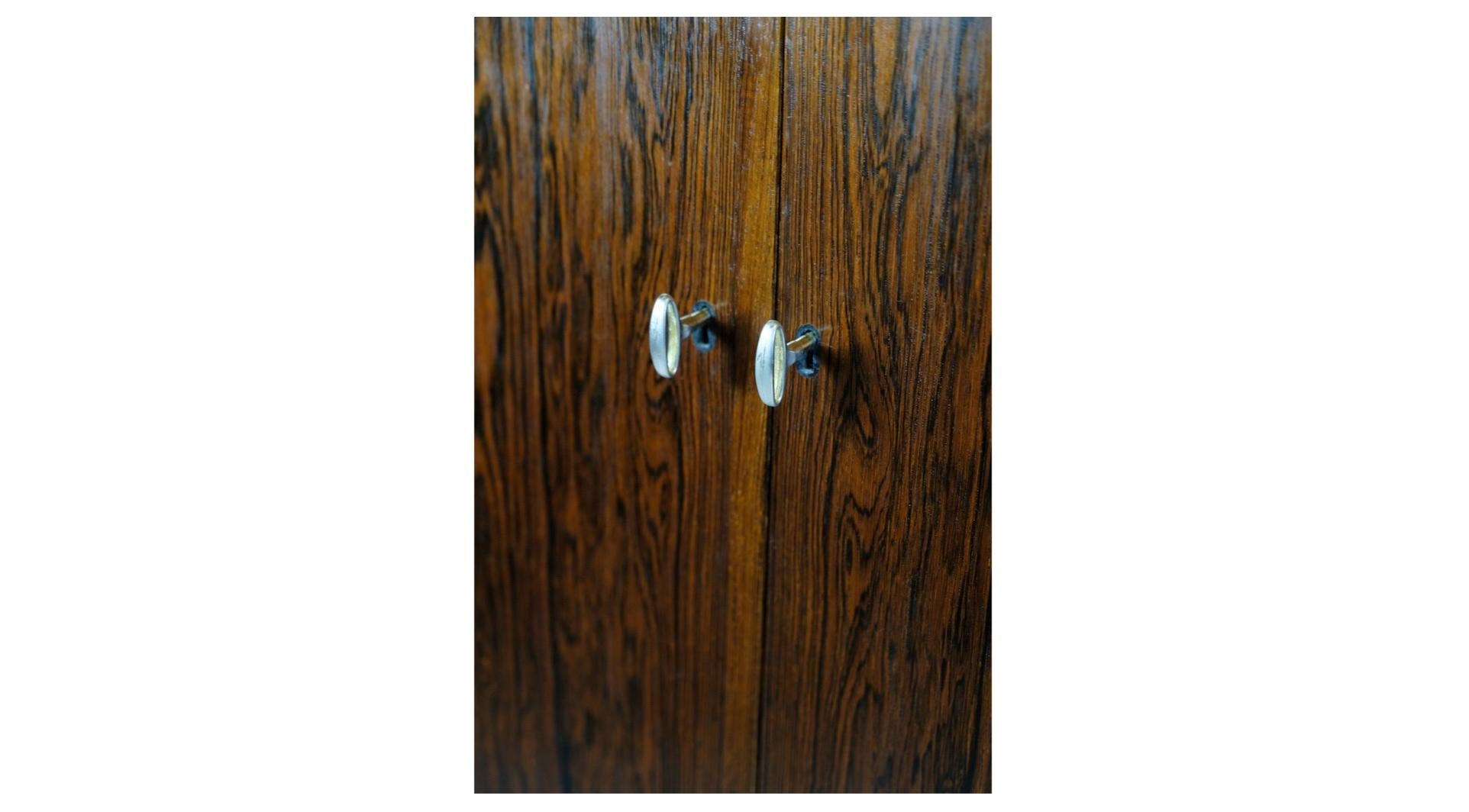 Cabinet / Rosewood furniture with doors and drawers designed by Ole Wanscher from around the 1960s.
Dimensions in cm: H: 151.5 W: 196 D: 42.
Great condition.